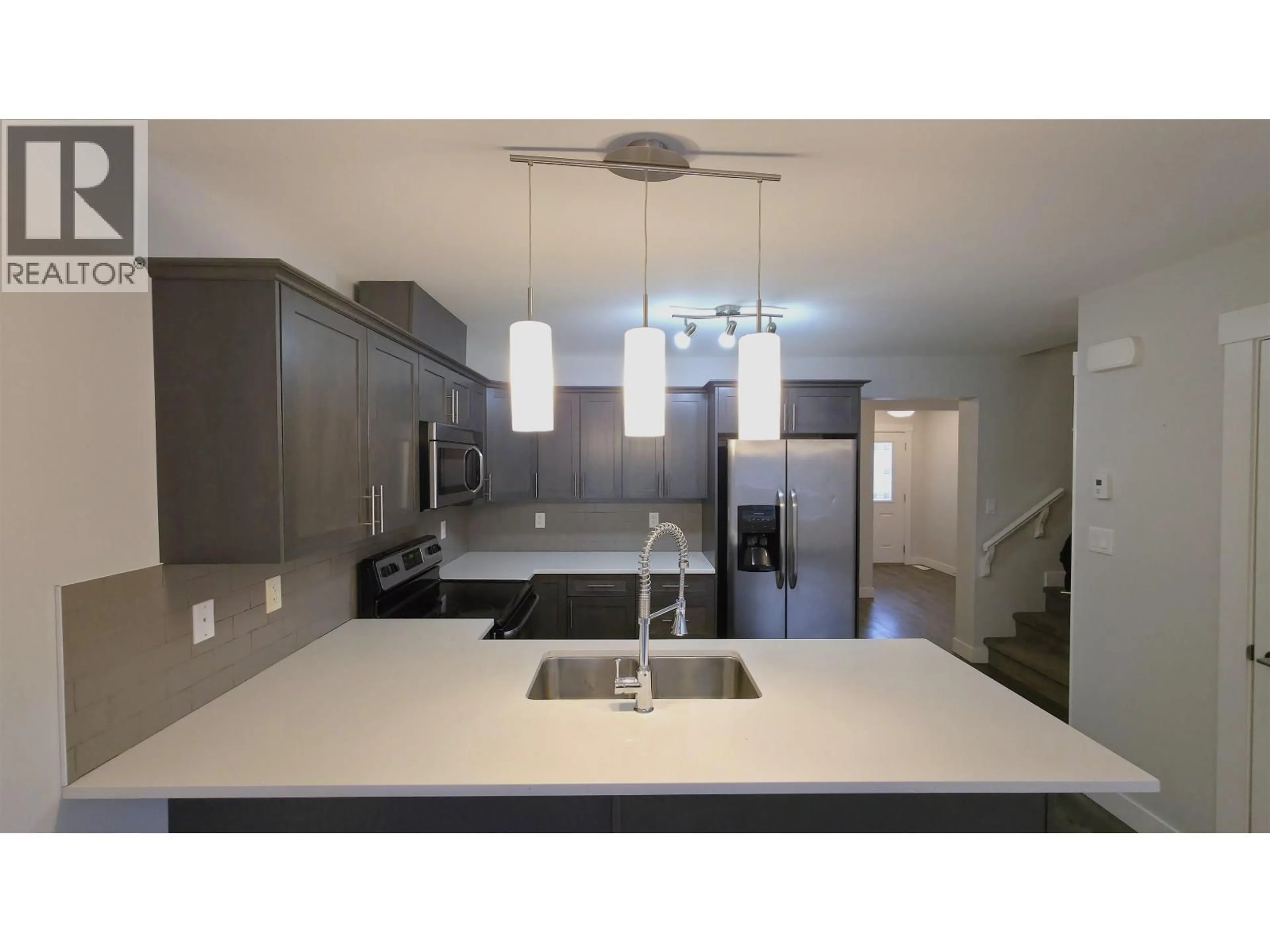 Open concept kitchen, unknown for 101 - 6798 WESTGATE AVENUE, Prince George British Columbia V2N0H6