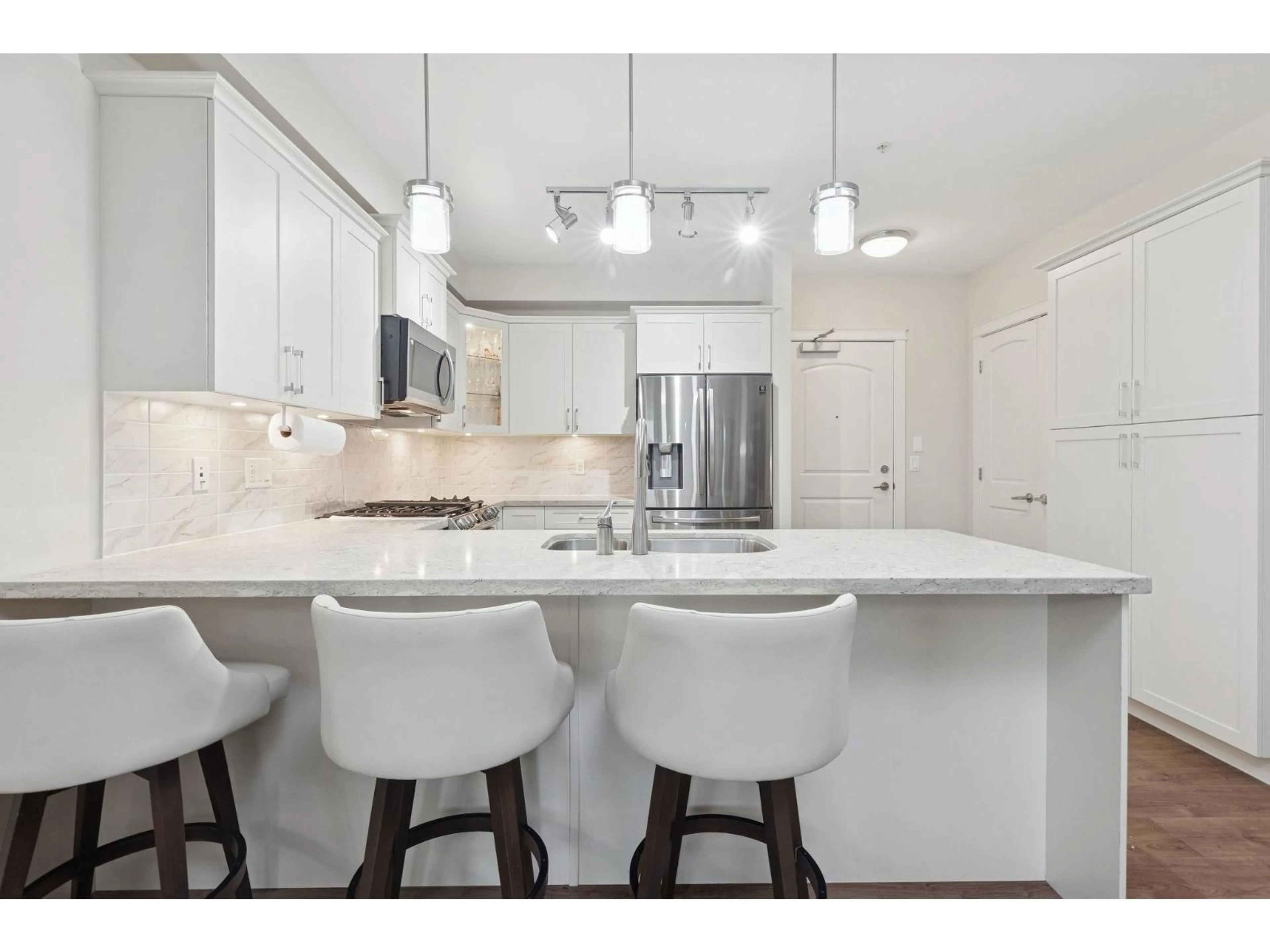 Open concept kitchen, unknown for 209 - 3535 146A STREET, Surrey British Columbia V4P0H2