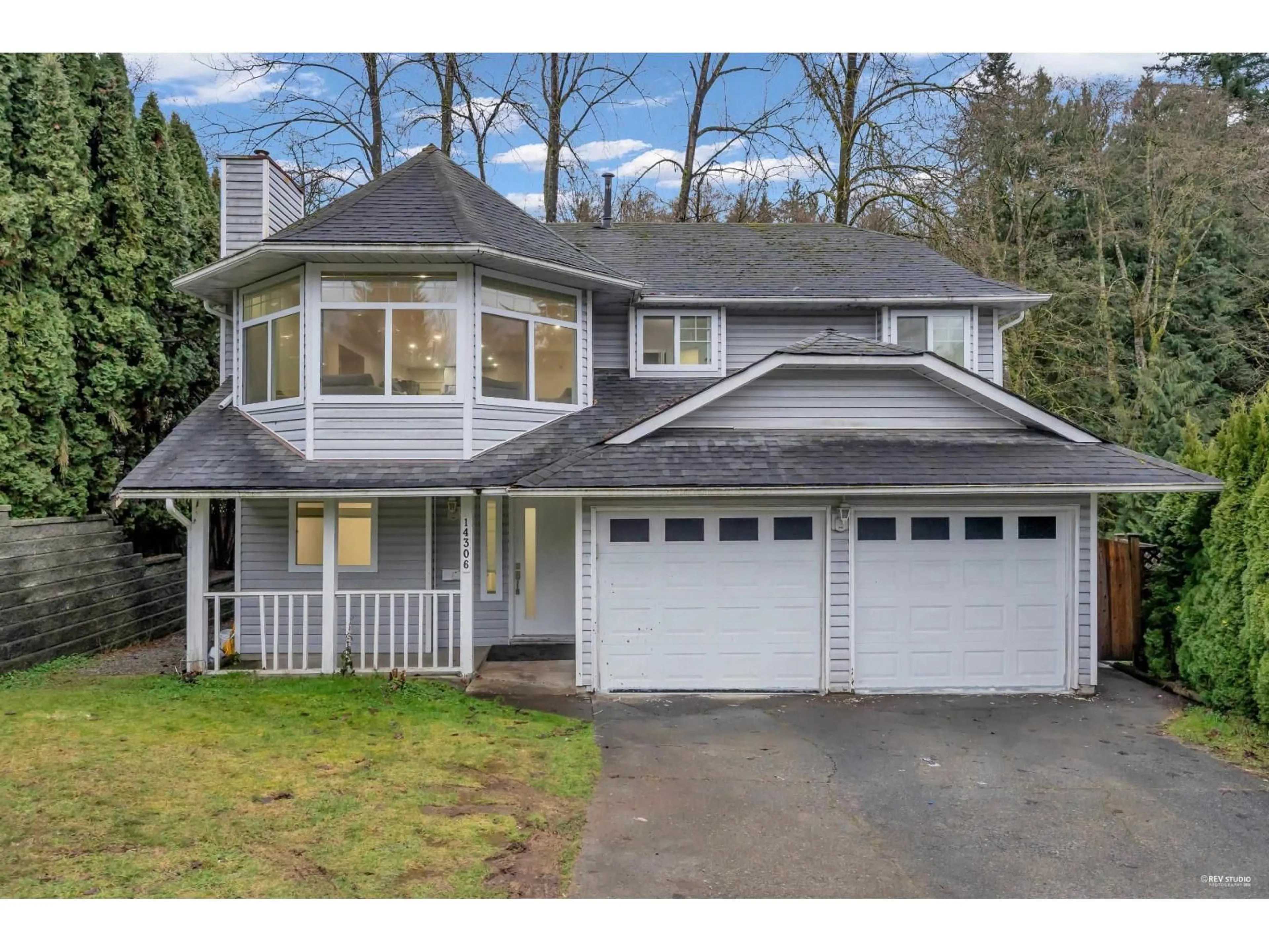 Home with vinyl exterior material, street for 14306 77A AVENUE, Surrey British Columbia V3W0L2