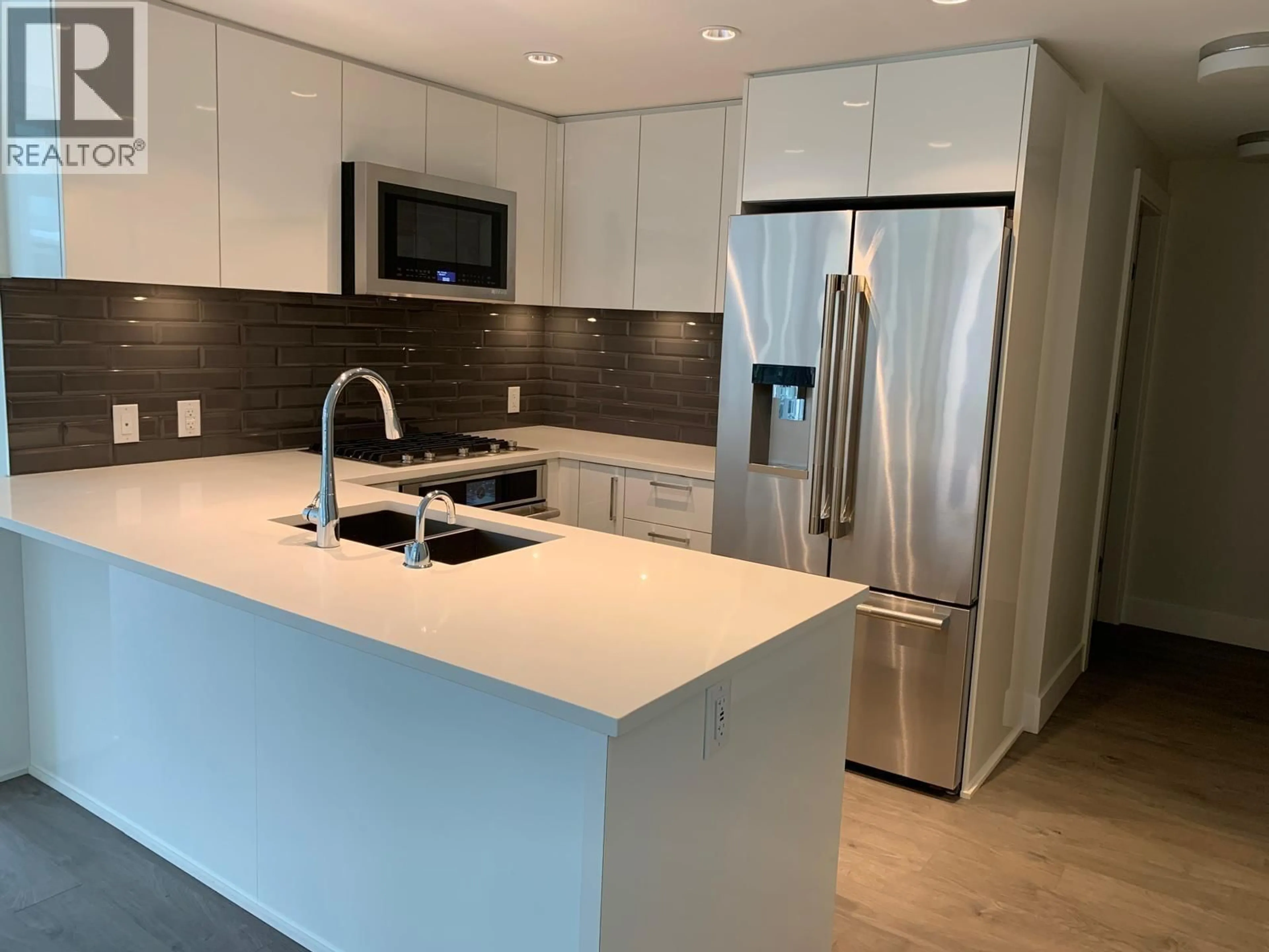 Open concept kitchen, unknown for 302 - 8533 RIVER DISTRICT CROSSING, Vancouver British Columbia V5S0C8