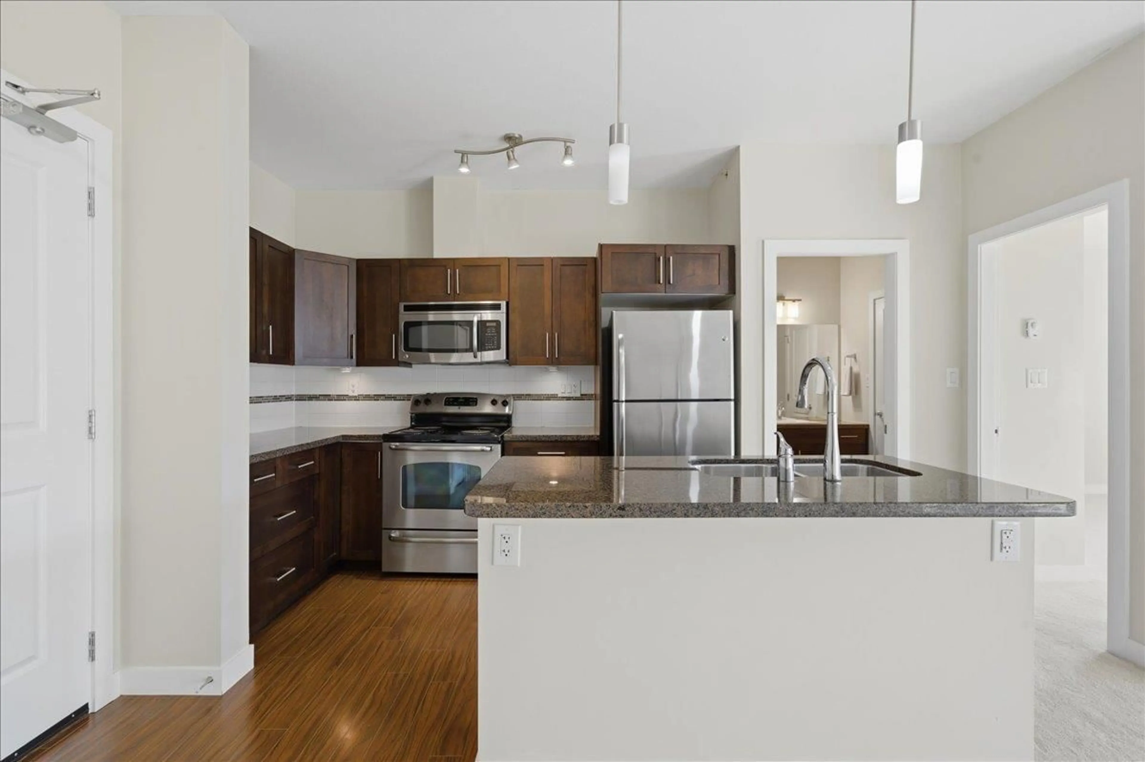 Open concept kitchen, unknown for 411 - 33898 PINE STREET, Abbotsford British Columbia V2S2P3