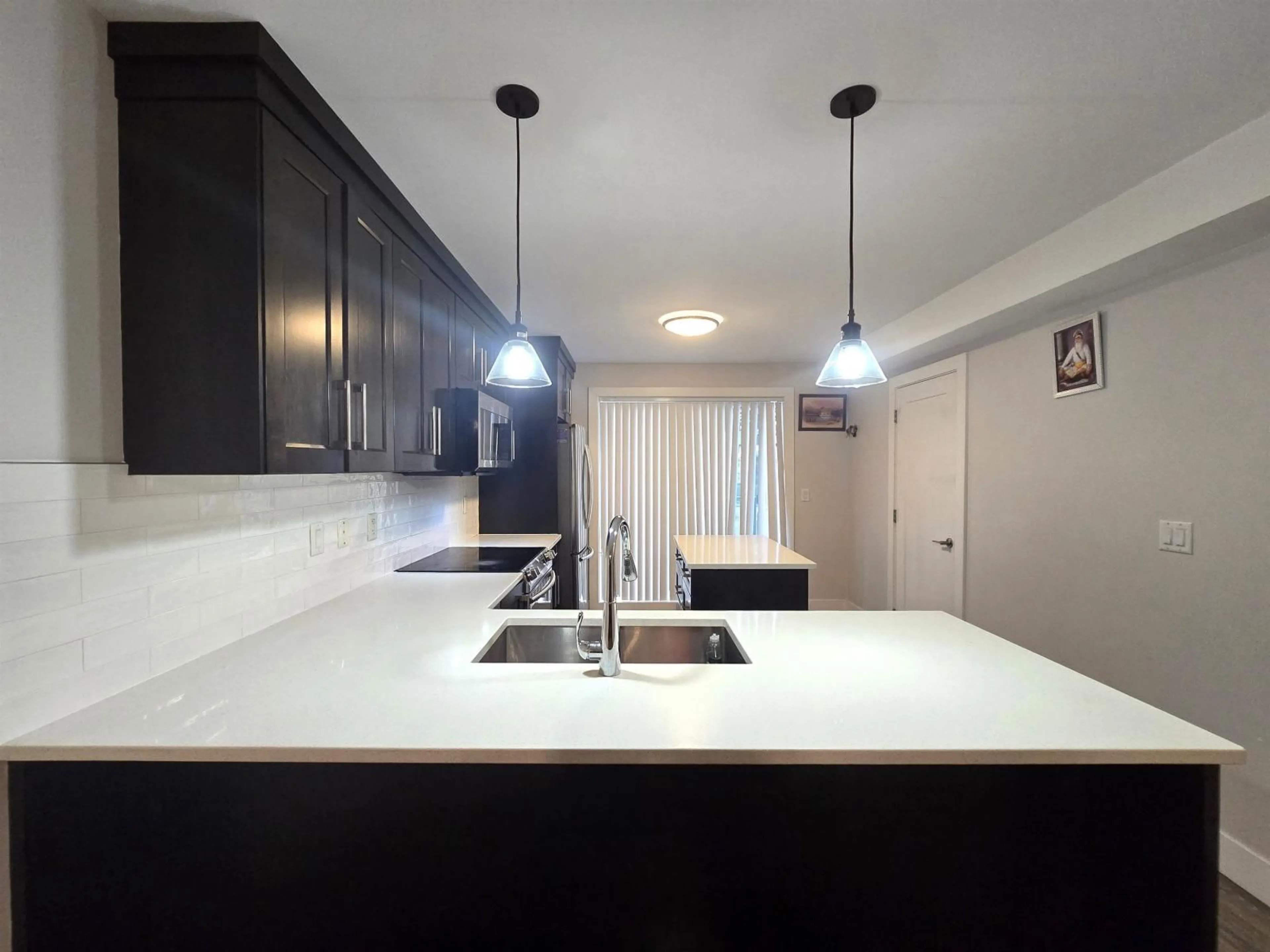 Open concept kitchen, unknown for 11 - 32138 GEORGE FERGUSON WAY, Abbotsford British Columbia V2T2K6