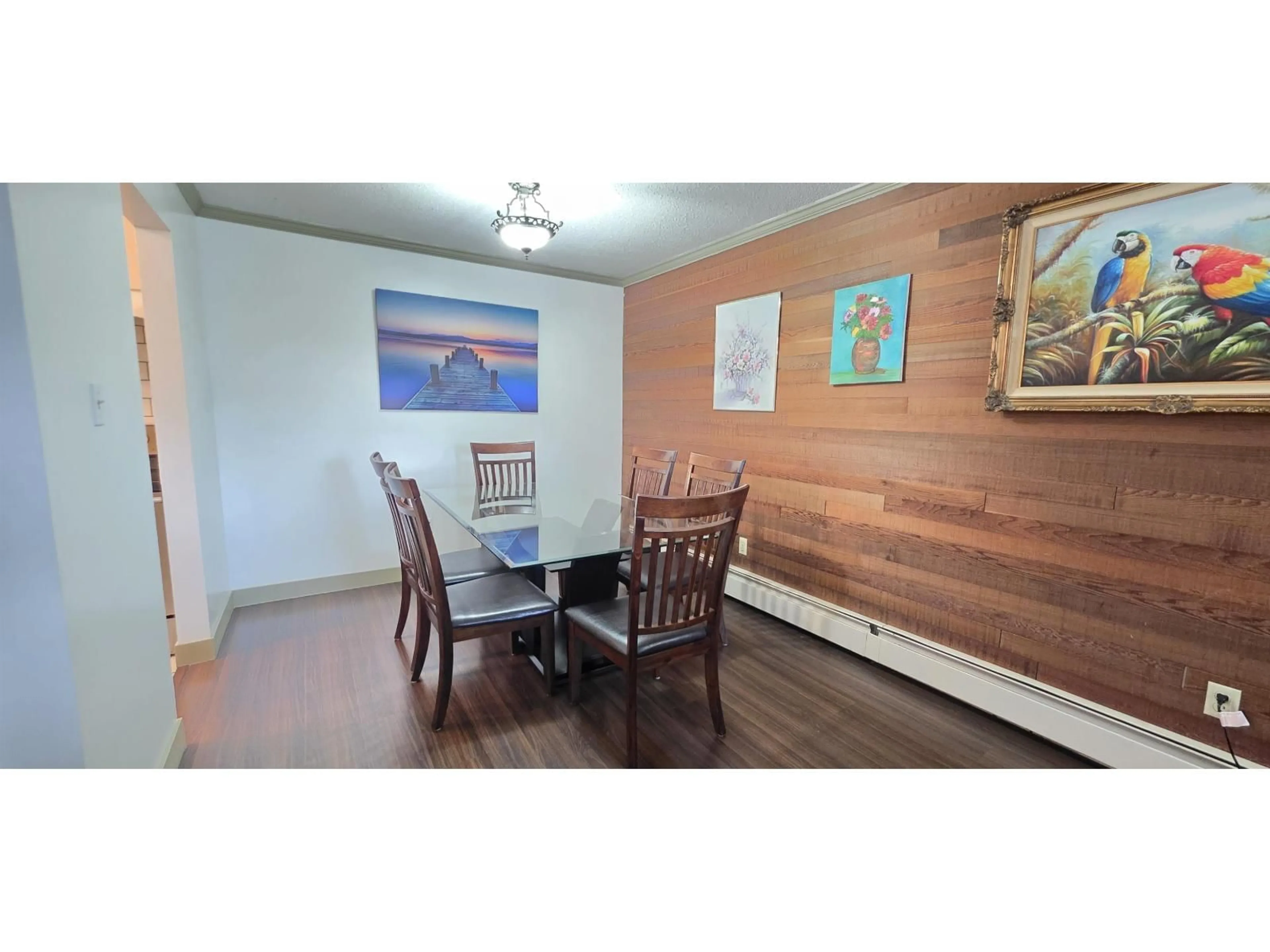 Dining room, wood/laminate floor for 202 - 7473 140 STREET, Surrey British Columbia V3W6G5