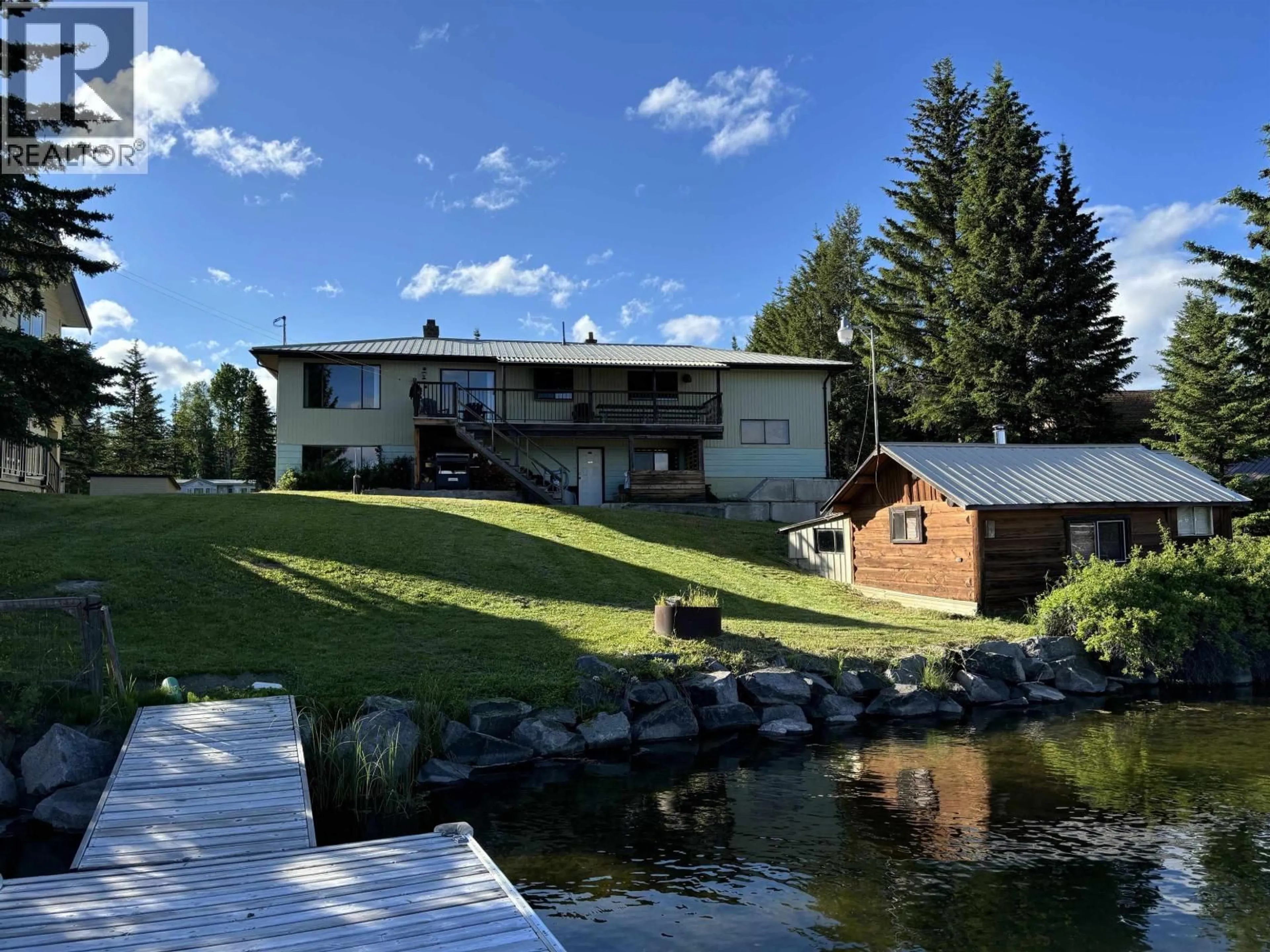 A pic from outside/outdoor area/front of a property/back of a property/a pic from drone, water/lake/river/ocean view for 7568 BURGESS ROAD, Deka Lake / Sulphurous / Hathaway Lakes British Columbia V0K1X3