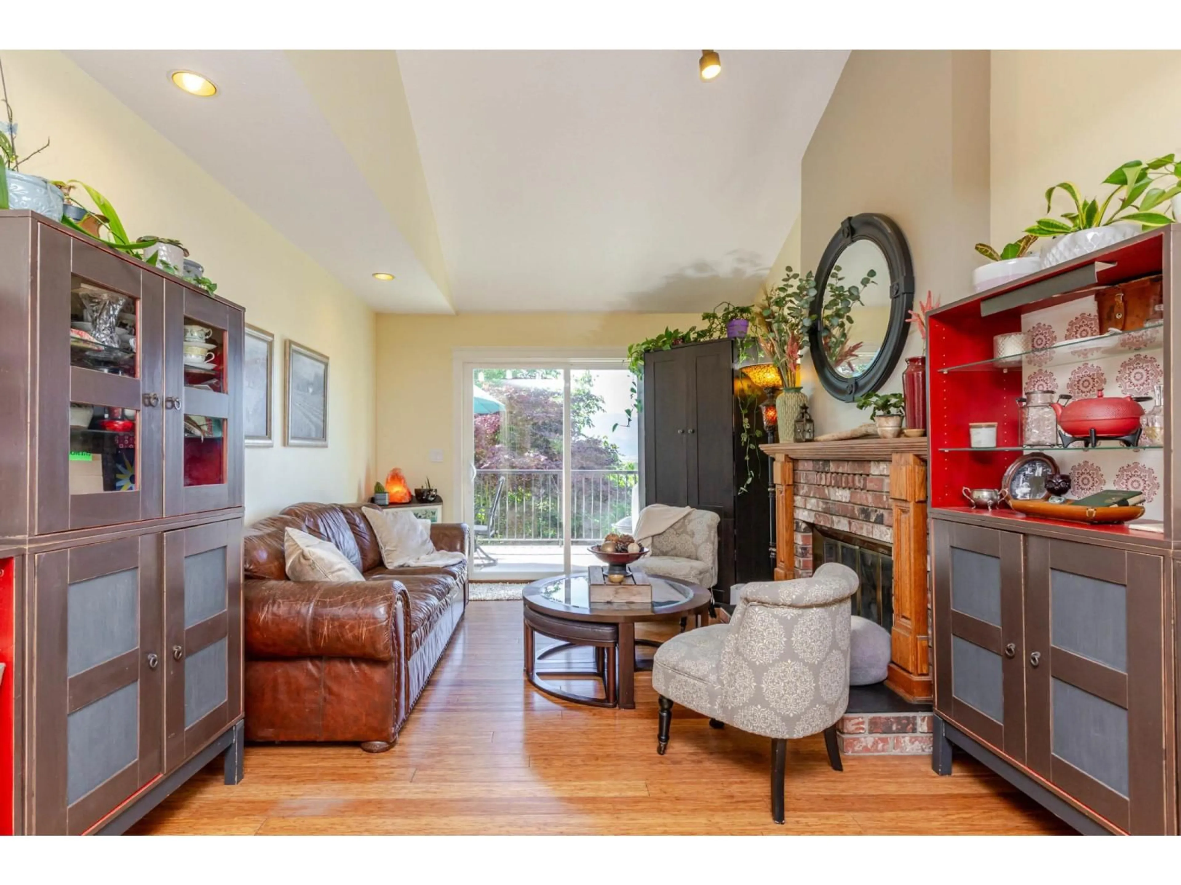 Living room with furniture, wood/laminate floor for 35210 ROCKWELL DRIVE, Abbotsford British Columbia V3G2C9