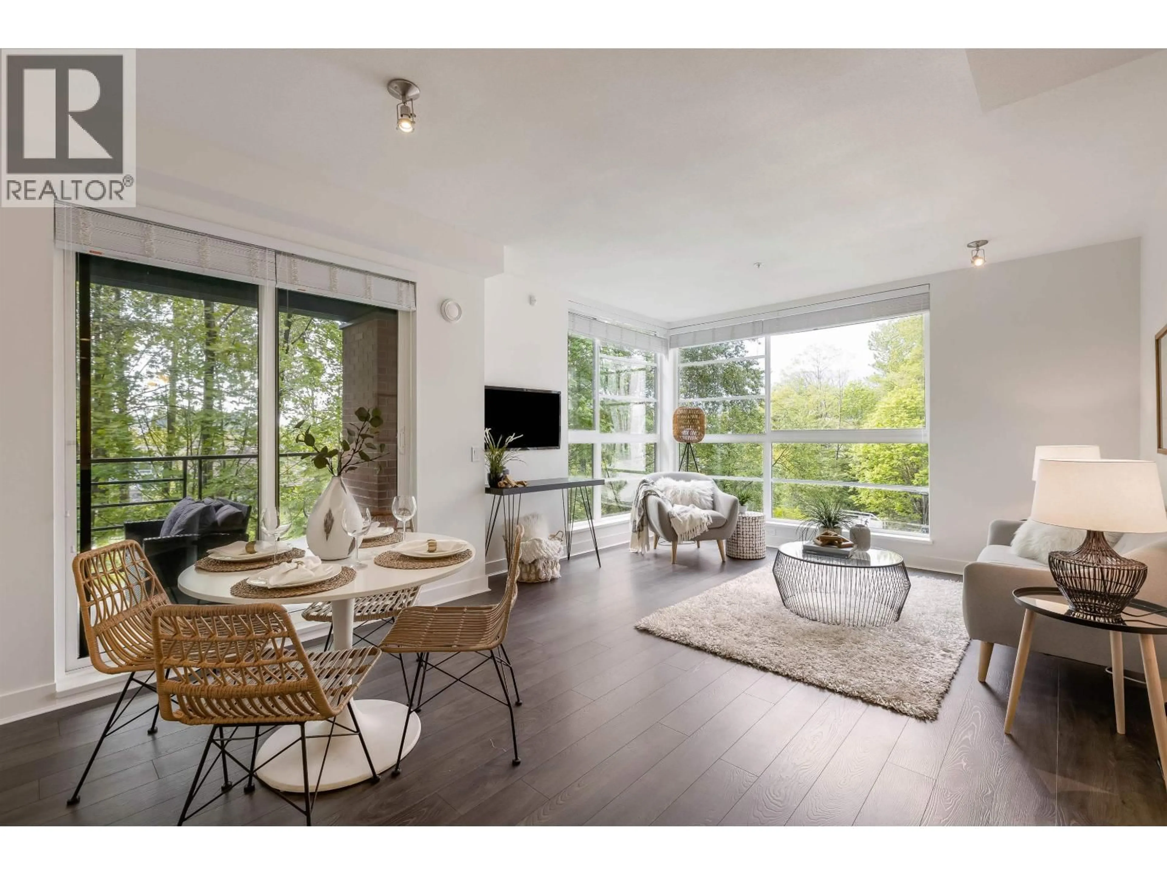 Living room with furniture, wood/laminate floor for 407 - 733 3RD STREET, North Vancouver British Columbia V7M0C8