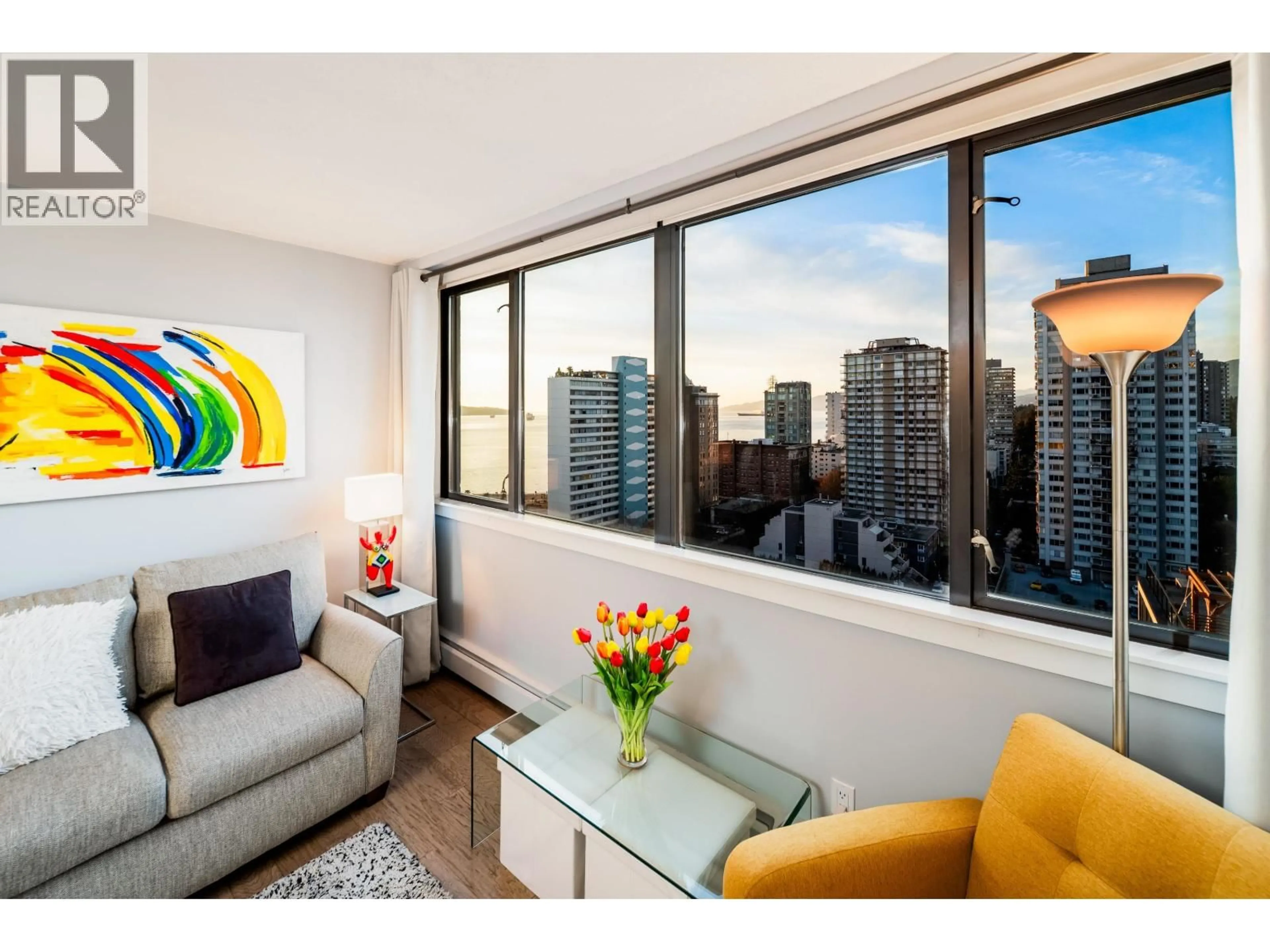 Living room with furniture, wood/laminate floor for 1501 - 1740 COMOX STREET, Vancouver British Columbia V6G2Z1