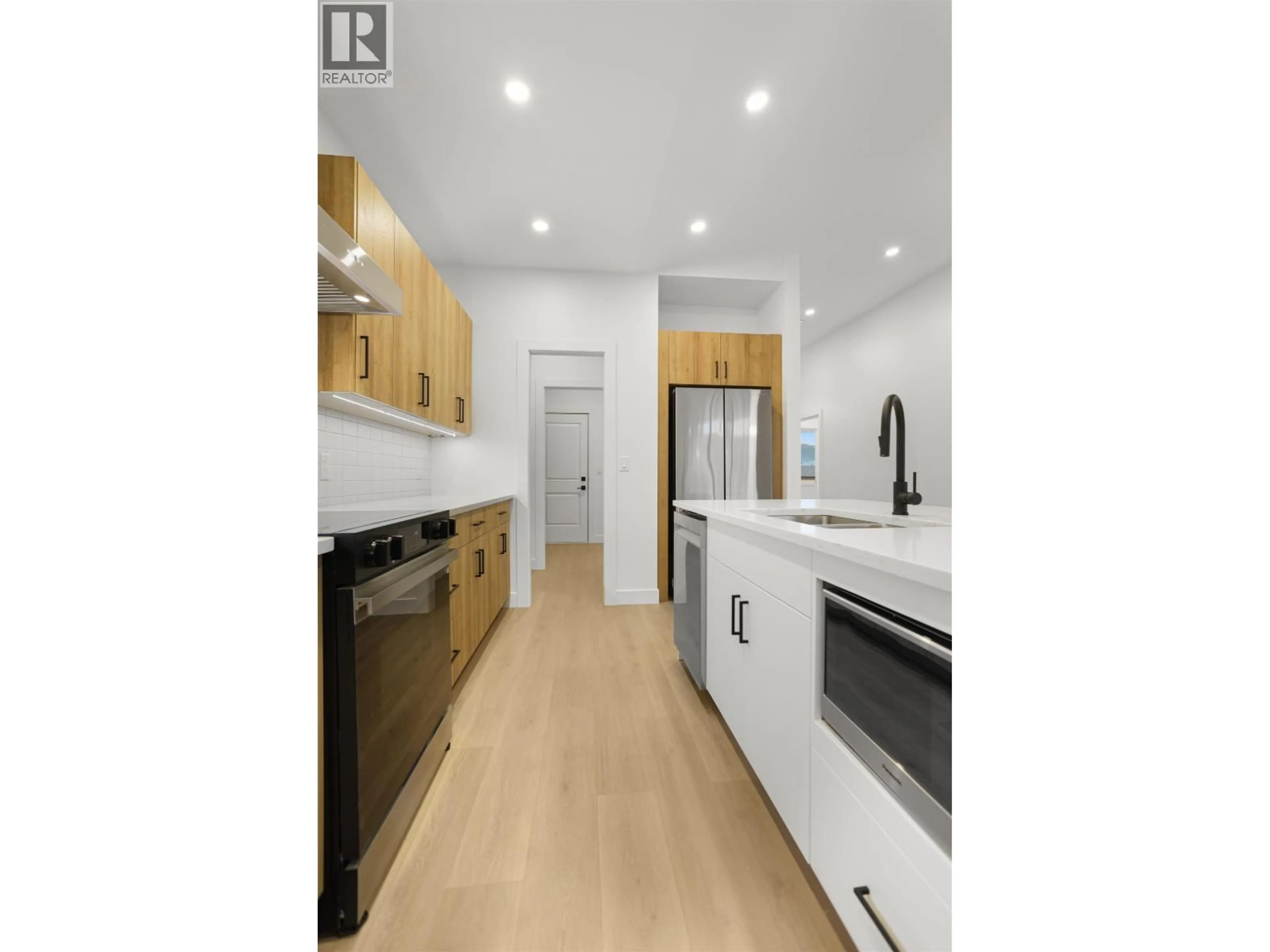 Open concept kitchen, wood/laminate floor for LOT 2 LOEPPKY PLACE, Terrace British Columbia V0G0G5