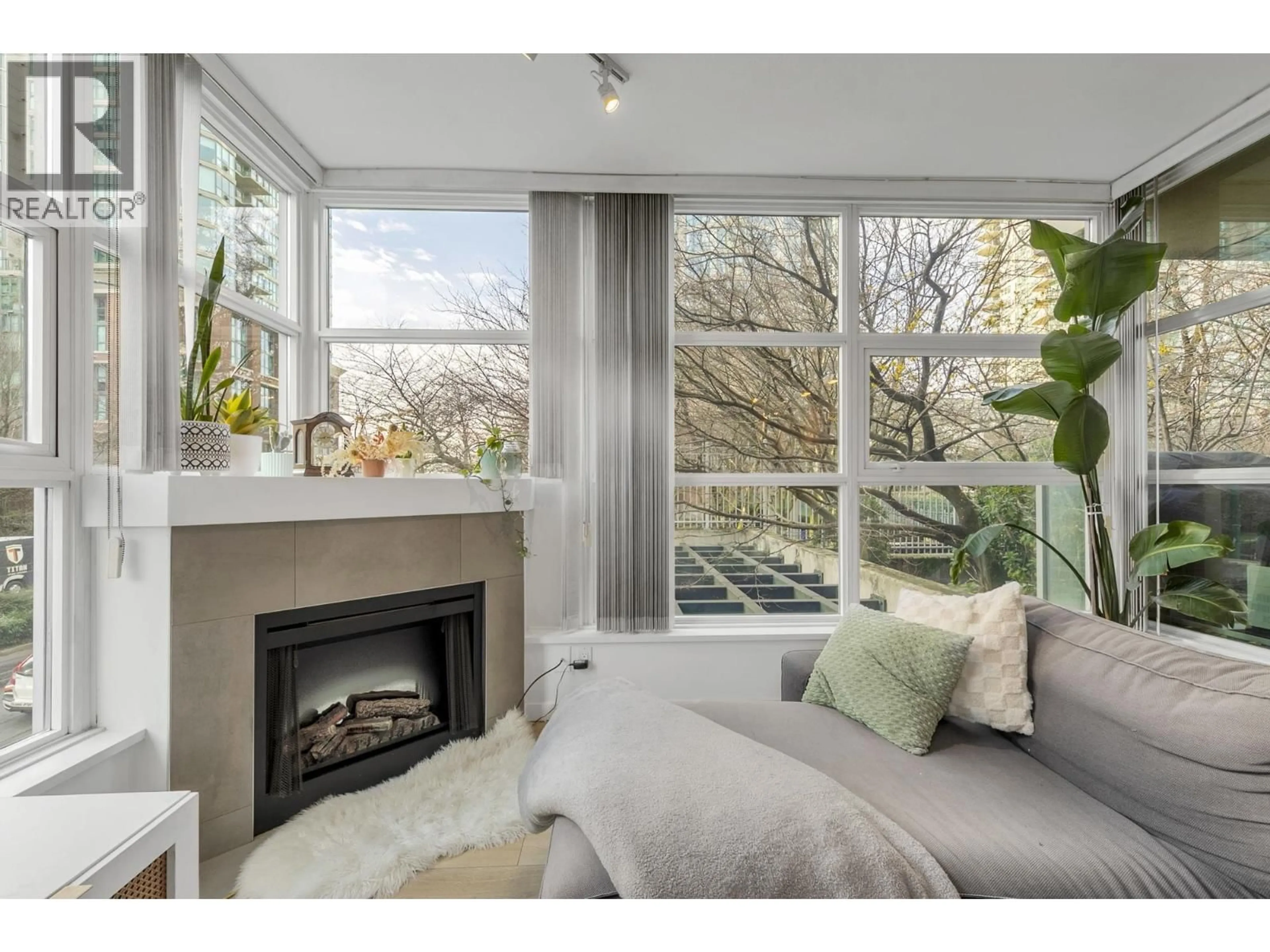 Living room with furniture, unknown for 205 - 189 NATIONAL AVENUE, Vancouver British Columbia V6A4L8