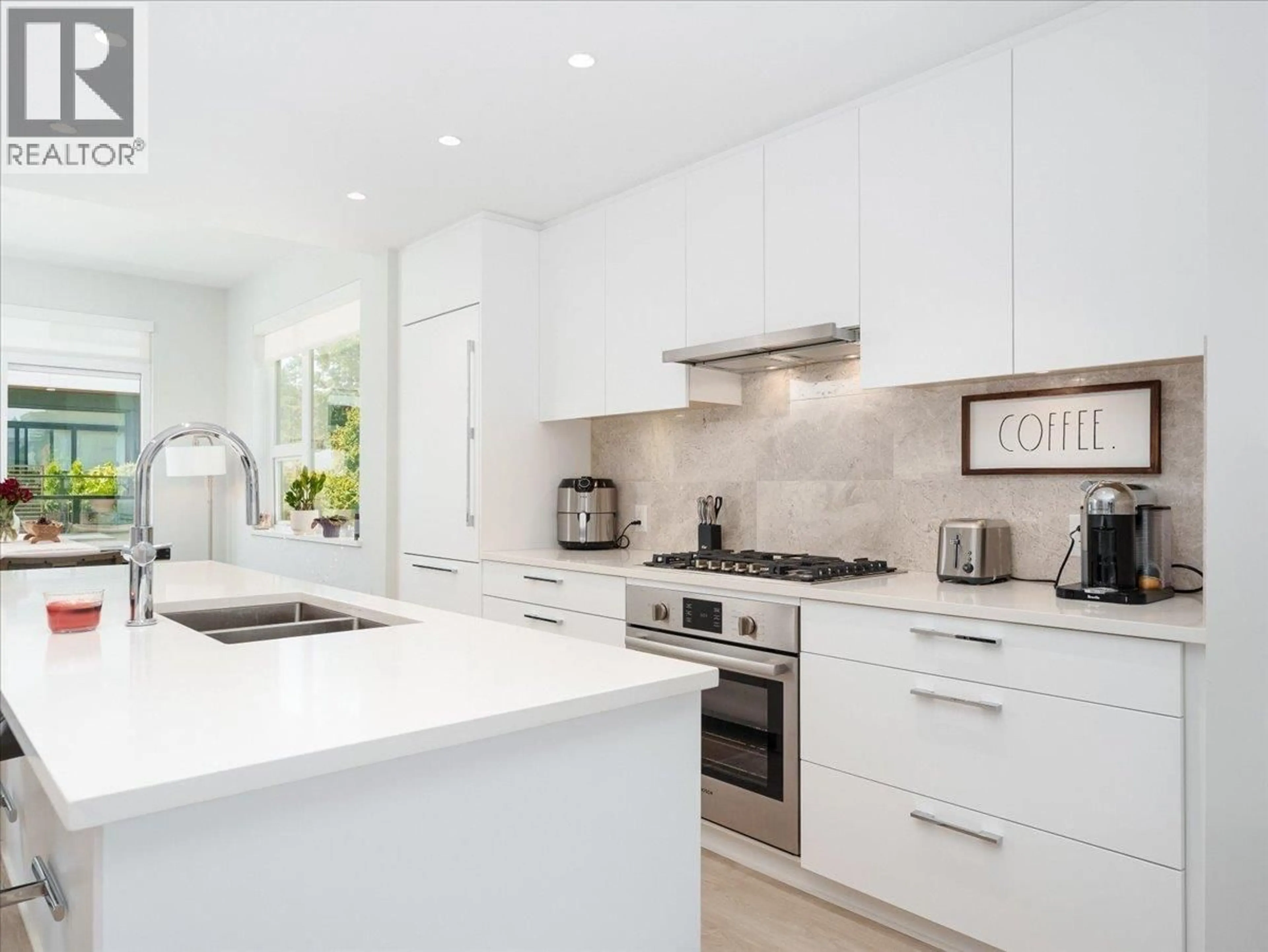 Contemporary kitchen, ceramic/tile floor for 13 - 2728 ACADIA ROAD, Vancouver British Columbia V6T0E6