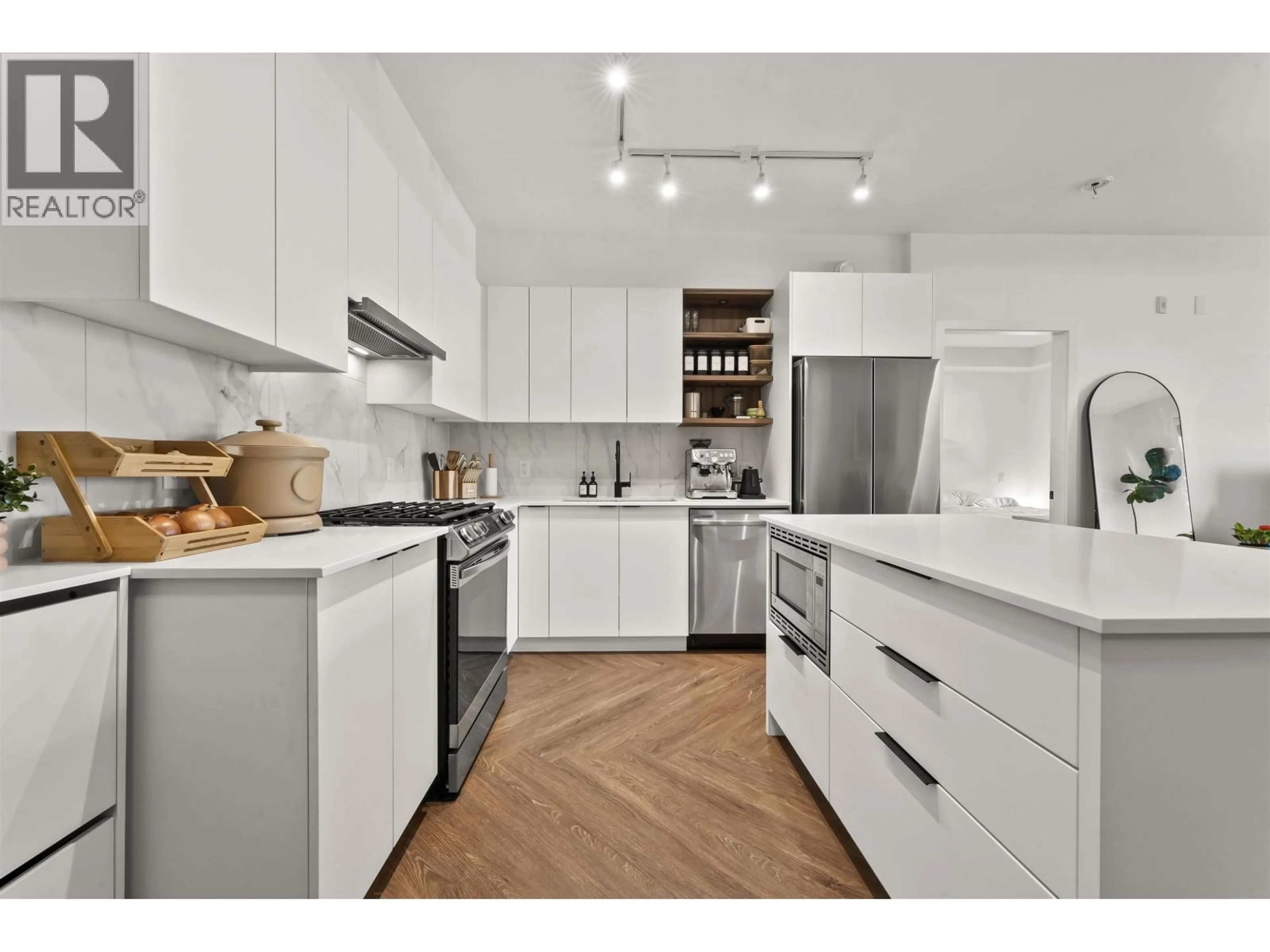 Open concept kitchen, unknown for 411 - 3229 ST JOHNS STREET, Port Moody British Columbia V3H0M4