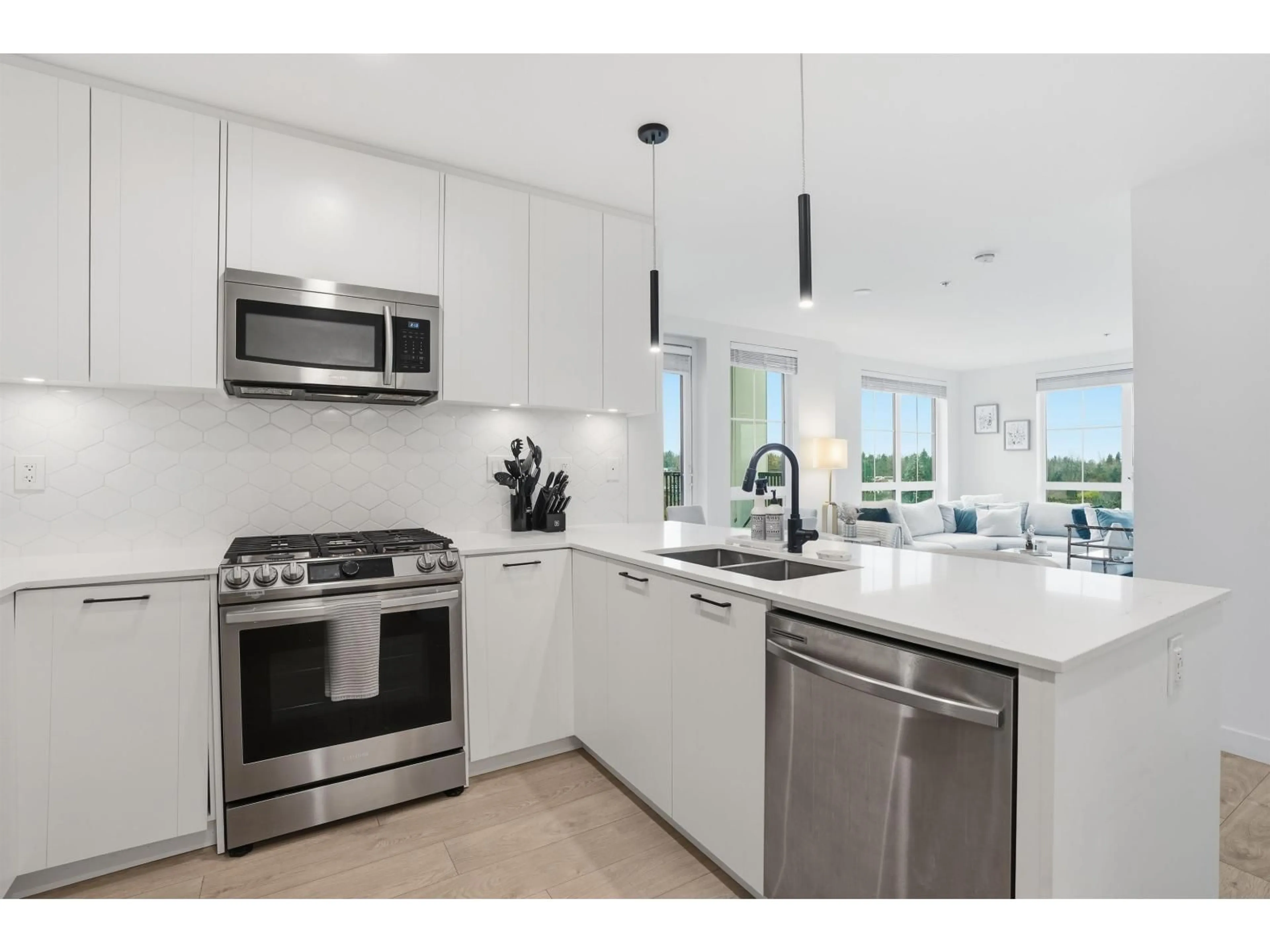 Open concept kitchen, ceramic/tile floor for A410 - 20018 83A AVENUE, Langley British Columbia V2Y3P2