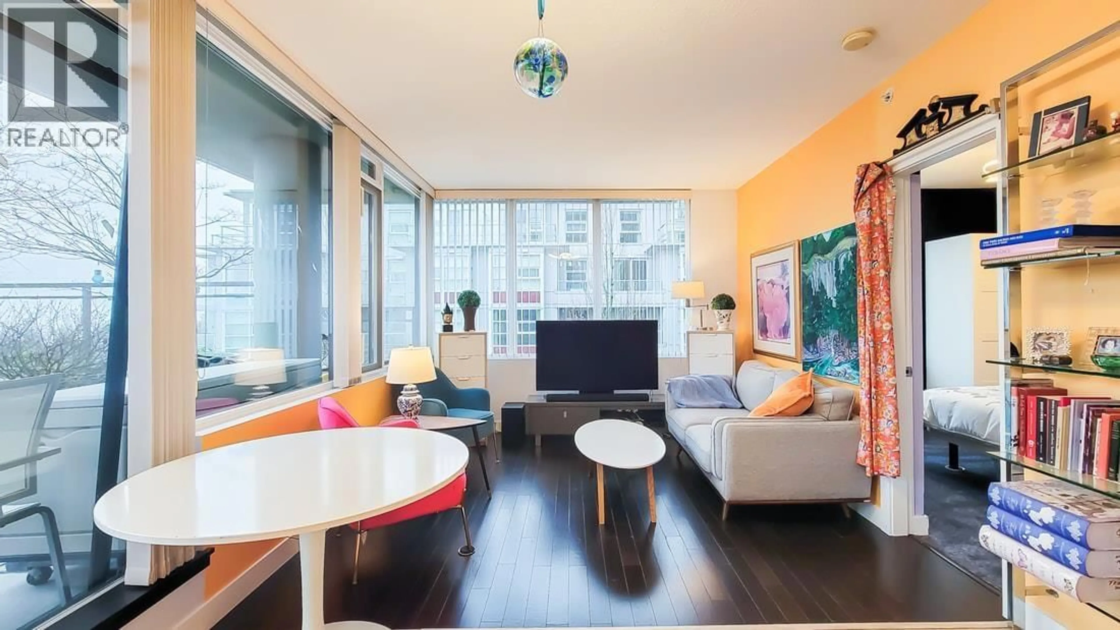 Living room with furniture, wood/laminate floor for 409 - 9009 CORNERSTONE MEWS, Burnaby British Columbia V5A0B9