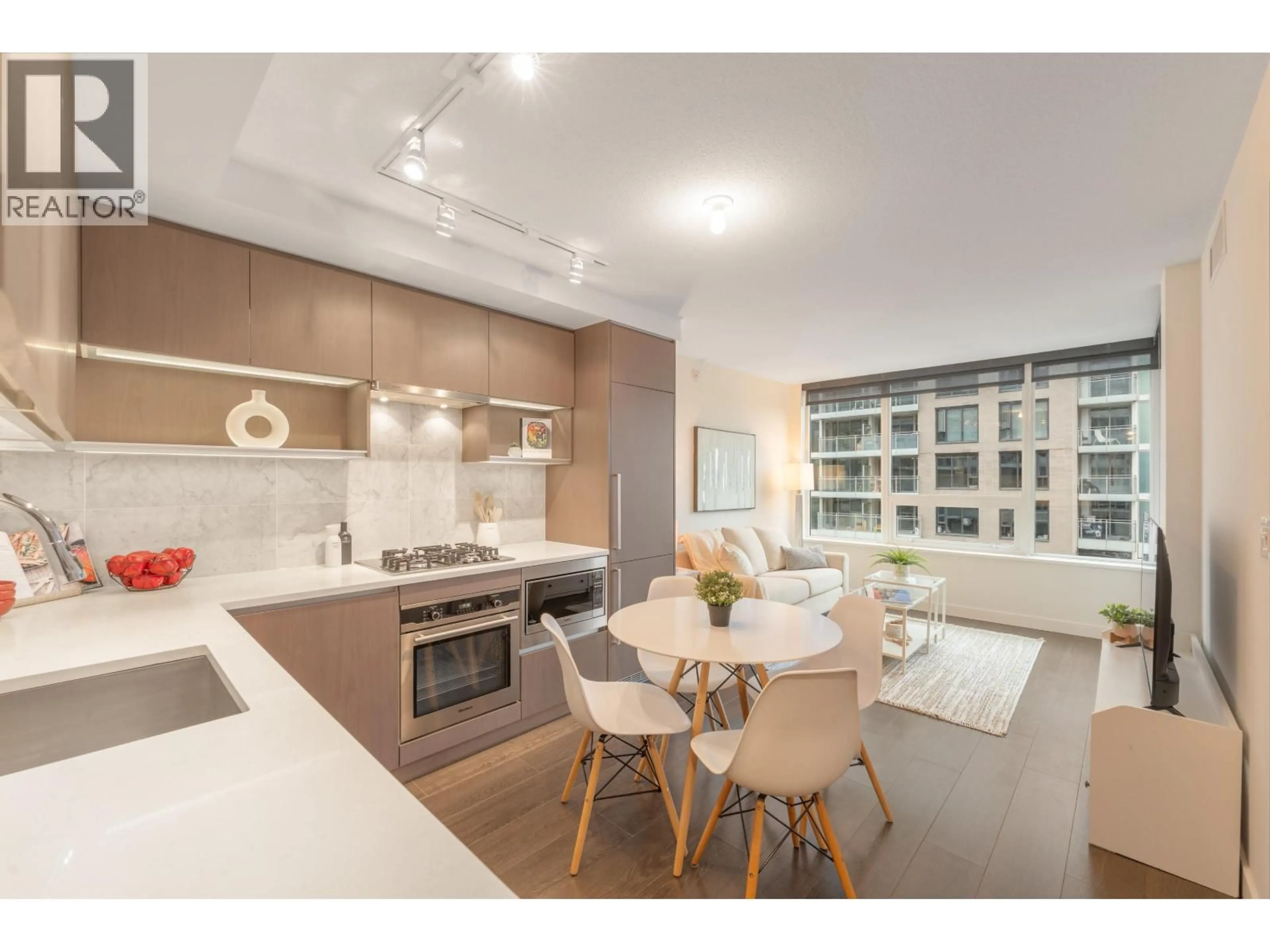 Open concept kitchen, wood/laminate floor for 706 - 3233 KETCHESON ROAD, Richmond British Columbia V6X0R3