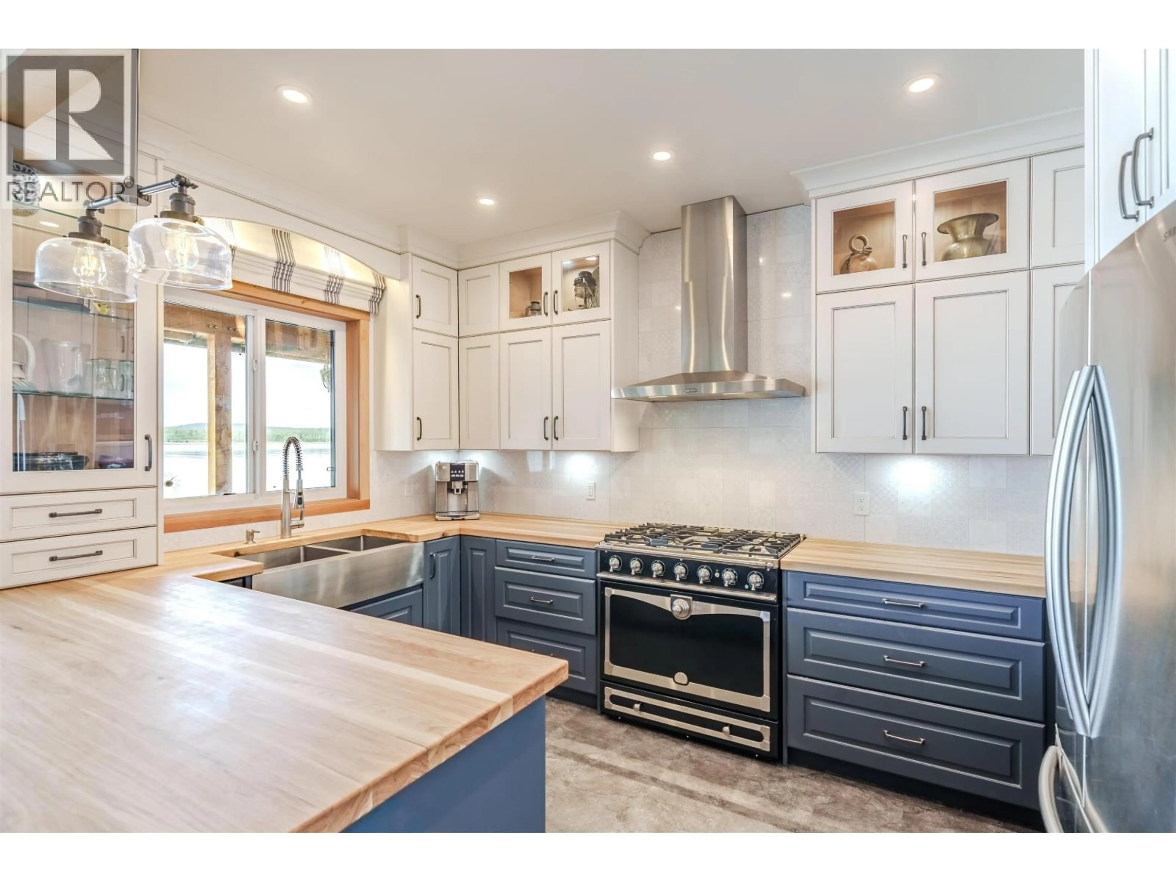 Open concept kitchen, ceramic/tile floor for 1211 GREEN LAKE ROAD, 100 Mile House British Columbia V0K2K0