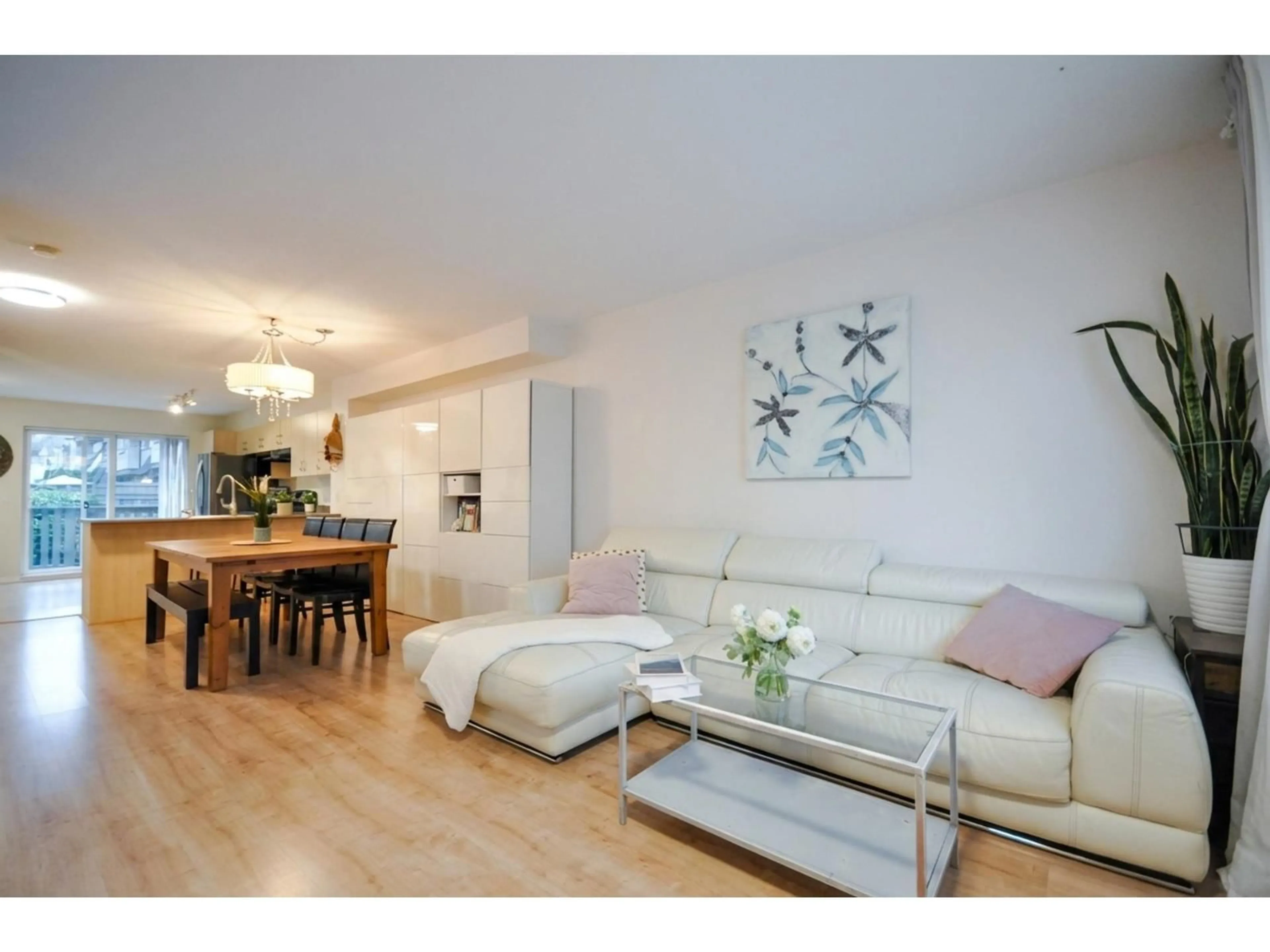 Living room with furniture, wood/laminate floor for 11 - 15871 85 AVENUE, Surrey British Columbia V4N0Y9