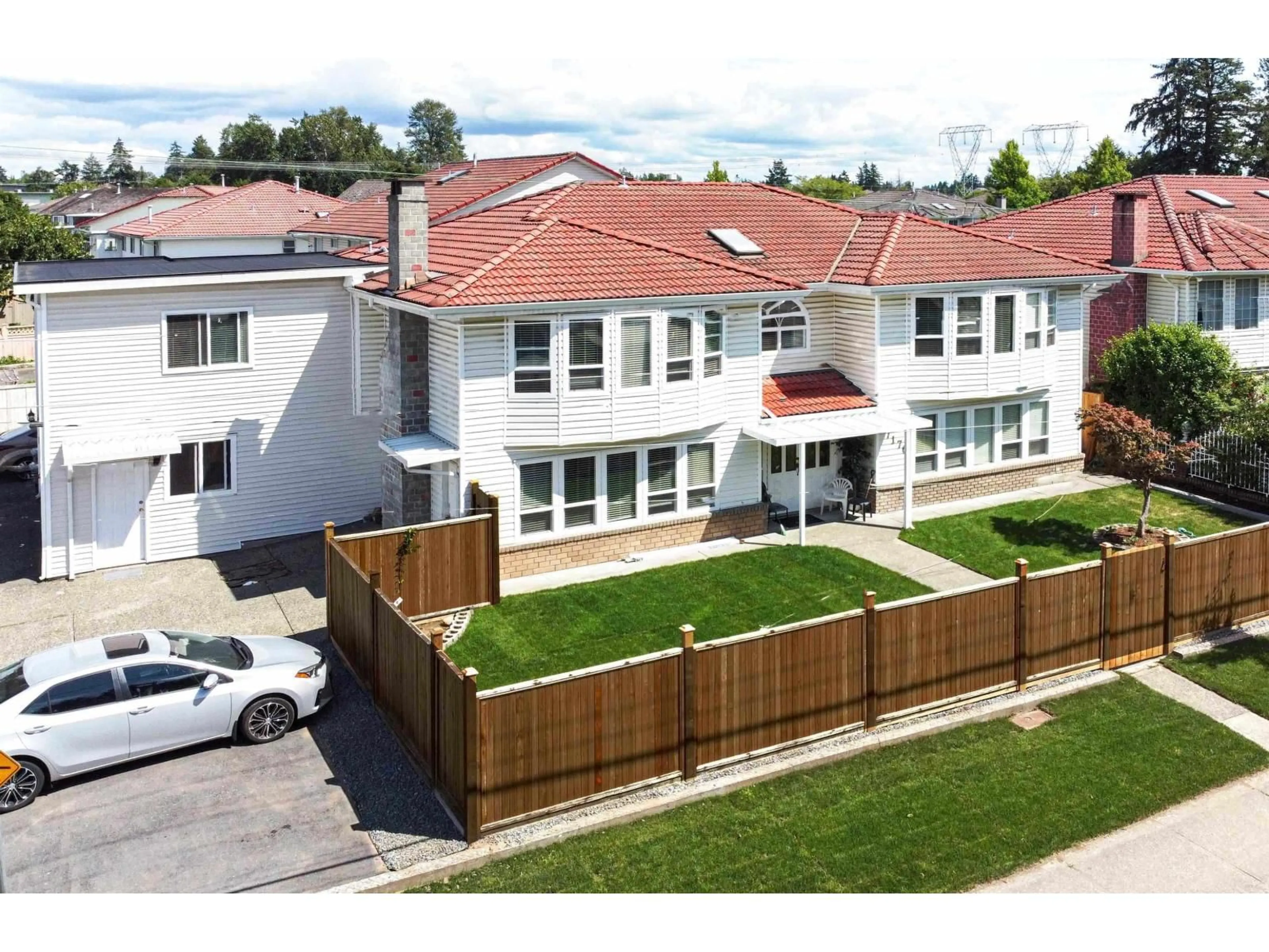 A pic from outside/outdoor area/front of a property/back of a property/a pic from drone, street for 7176 124 STREET, Surrey British Columbia V3W3W8