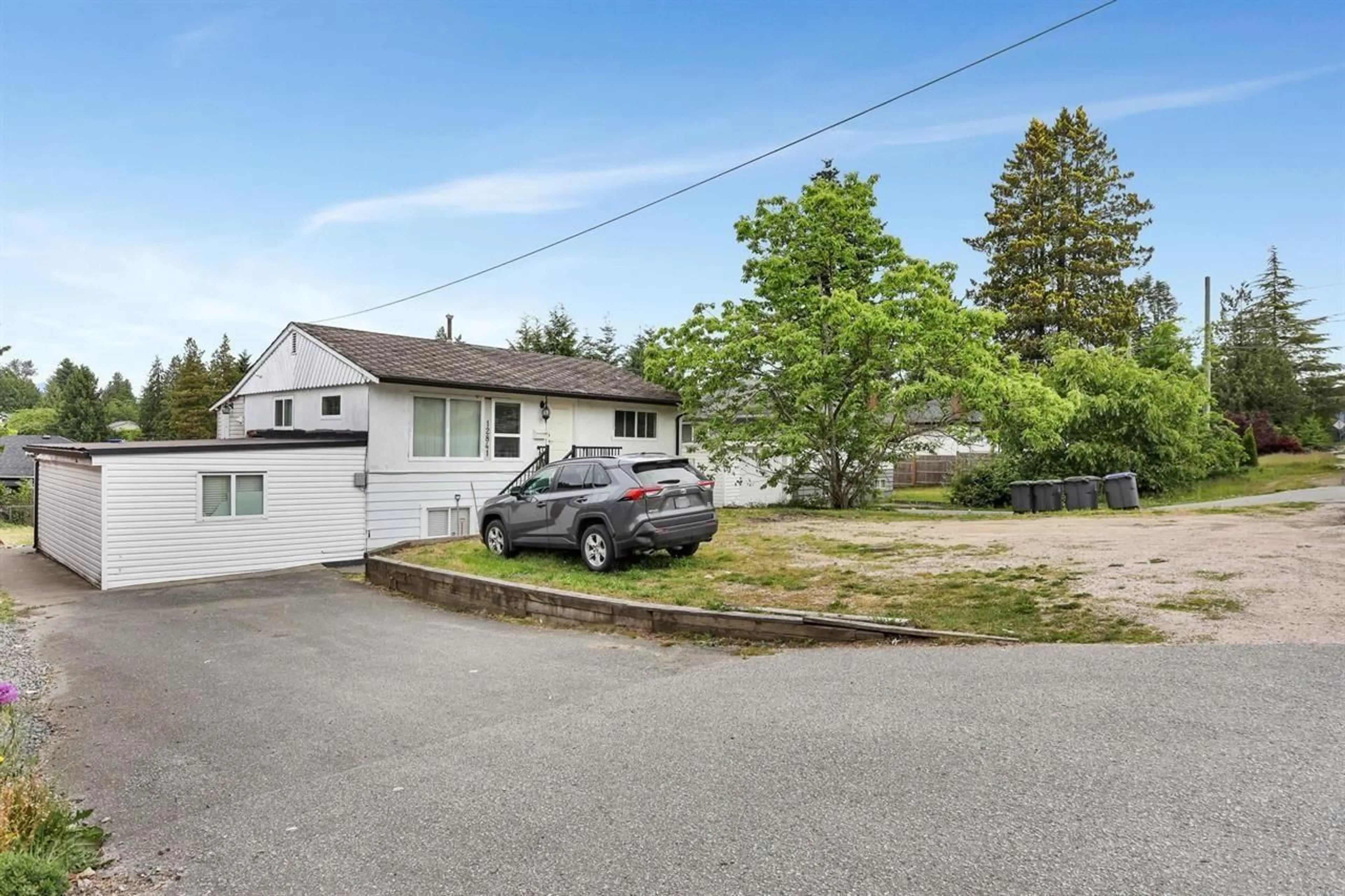 A pic from outside/outdoor area/front of a property/back of a property/a pic from drone, street for 12841 98 AVE AVENUE, Surrey British Columbia V2T5J9