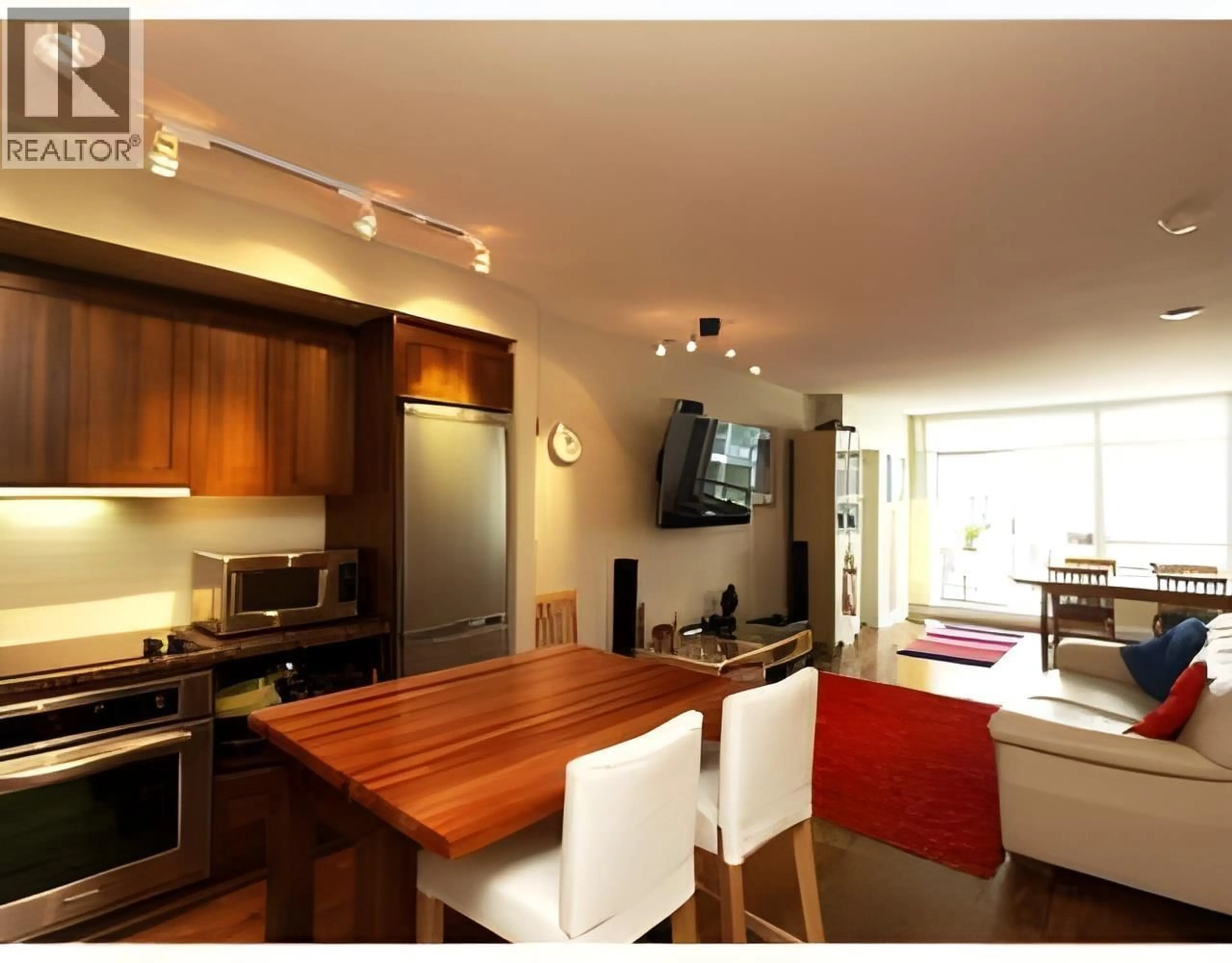 Open concept kitchen, wood/laminate floor for 511 - 2268 BROADWAY, Vancouver British Columbia V6K0B2