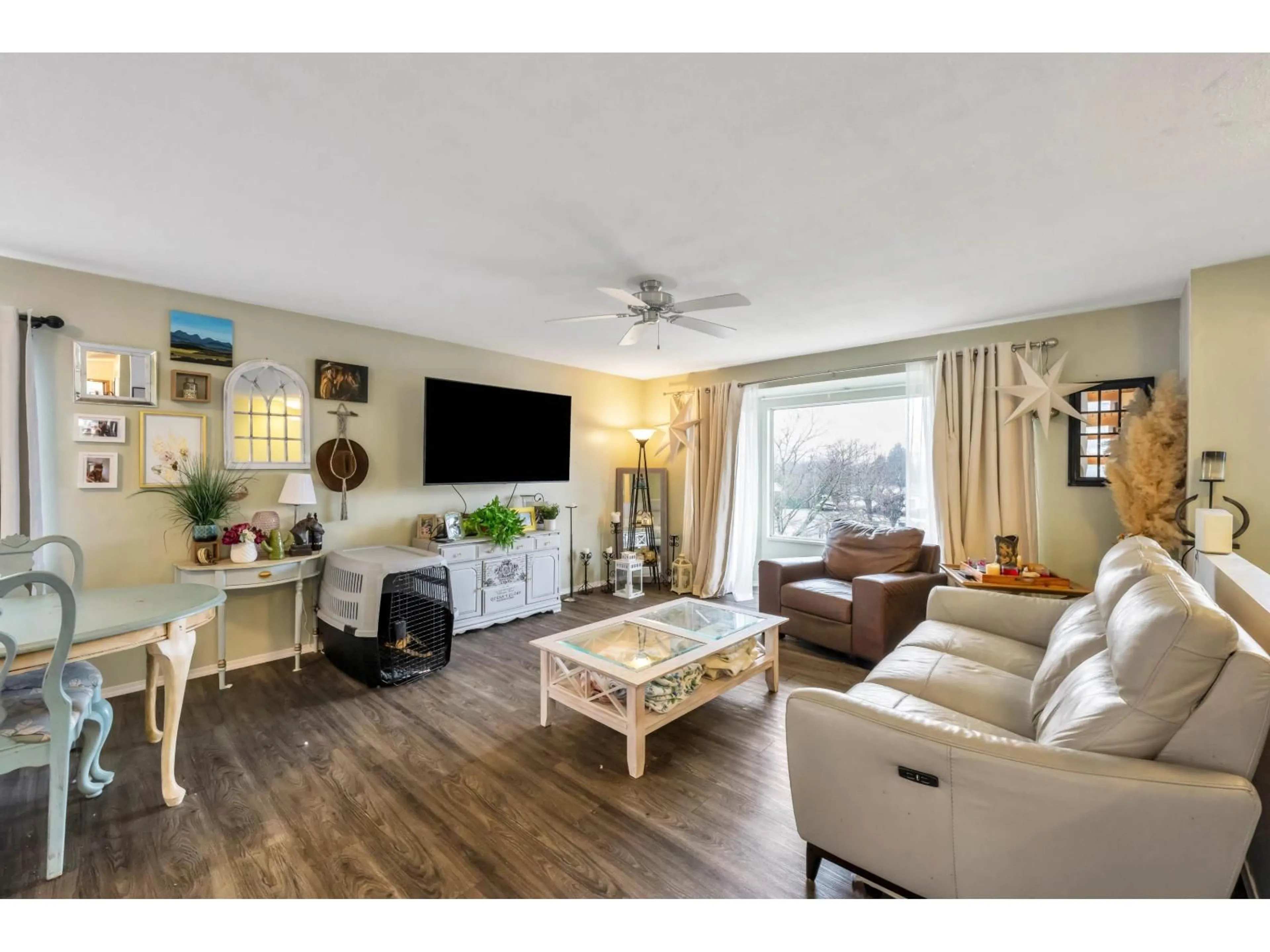 Living room with furniture, wood/laminate floor for 26626 30A AVENUE, Langley British Columbia V4W3C8