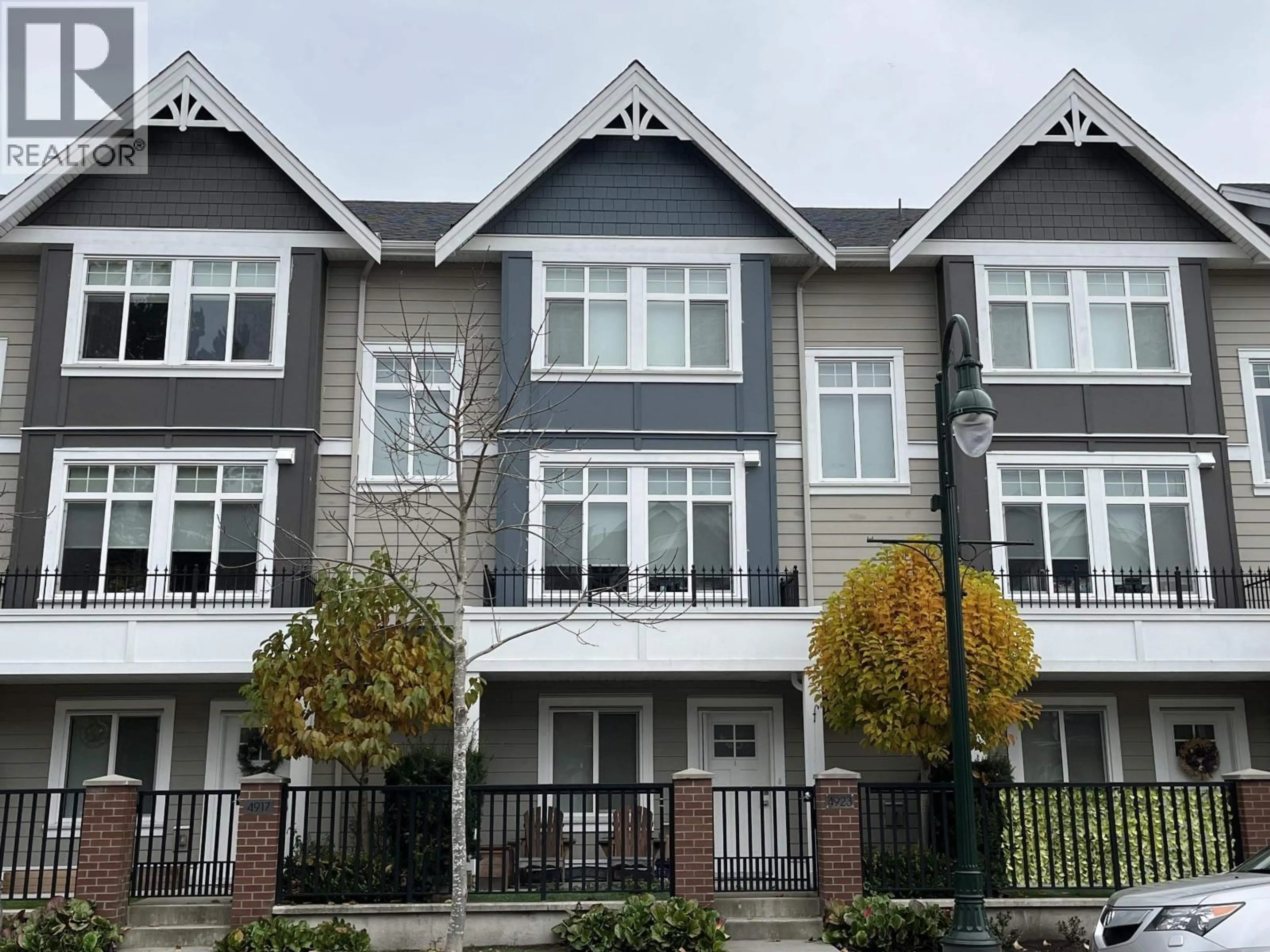 Home with vinyl exterior material, street for 4923 47A AVENUE, Ladner British Columbia V4K0E1