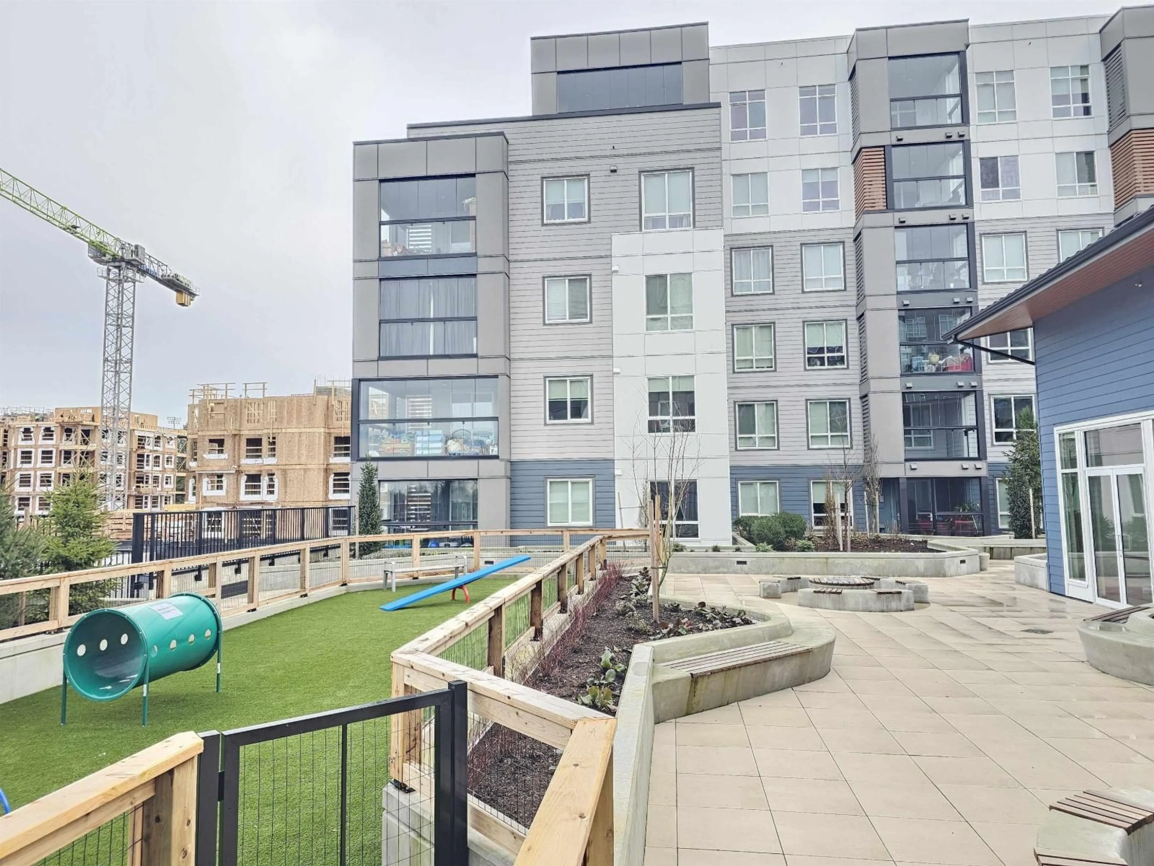 Patio, city buildings view from balcony for 508 - 19953 76 AVENUE, Langley British Columbia V2Y3Y1