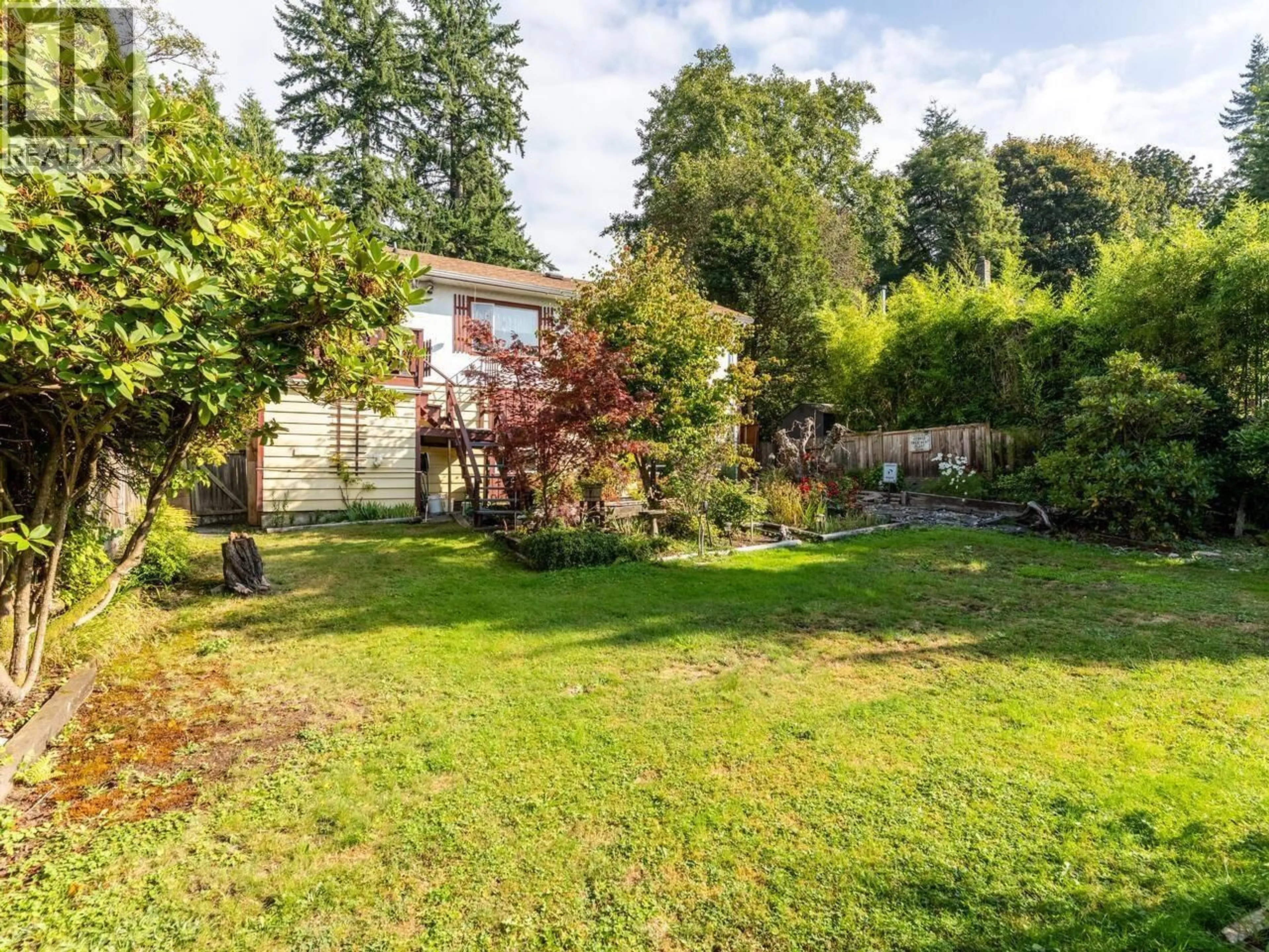 A pic from outside/outdoor area/front of a property/back of a property/a pic from drone, street for 1689 PETERS ROAD, North Vancouver British Columbia V1J1Y7