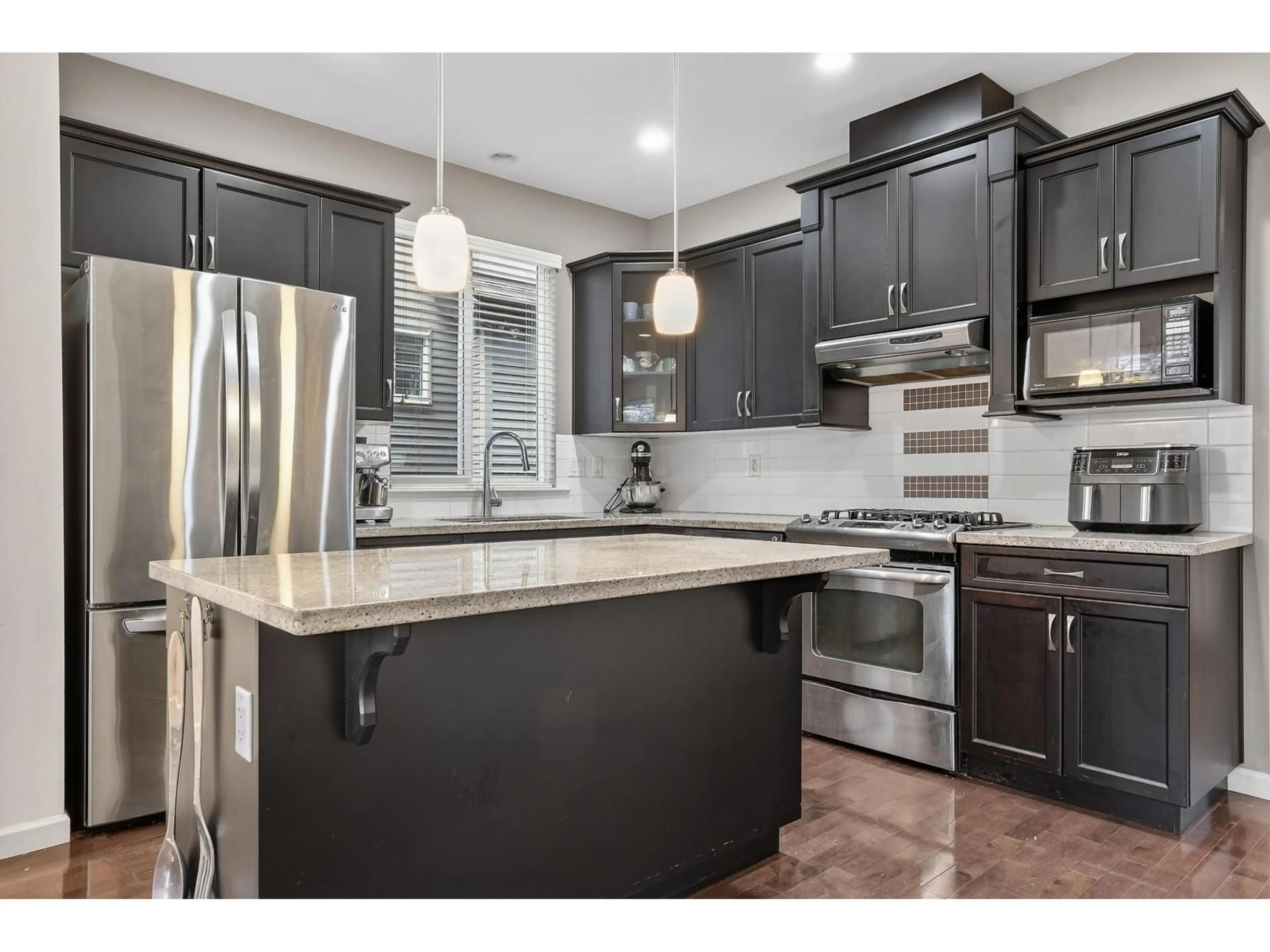 Open concept kitchen, unknown for 6909 208B STREET, Langley British Columbia V2Y0G3