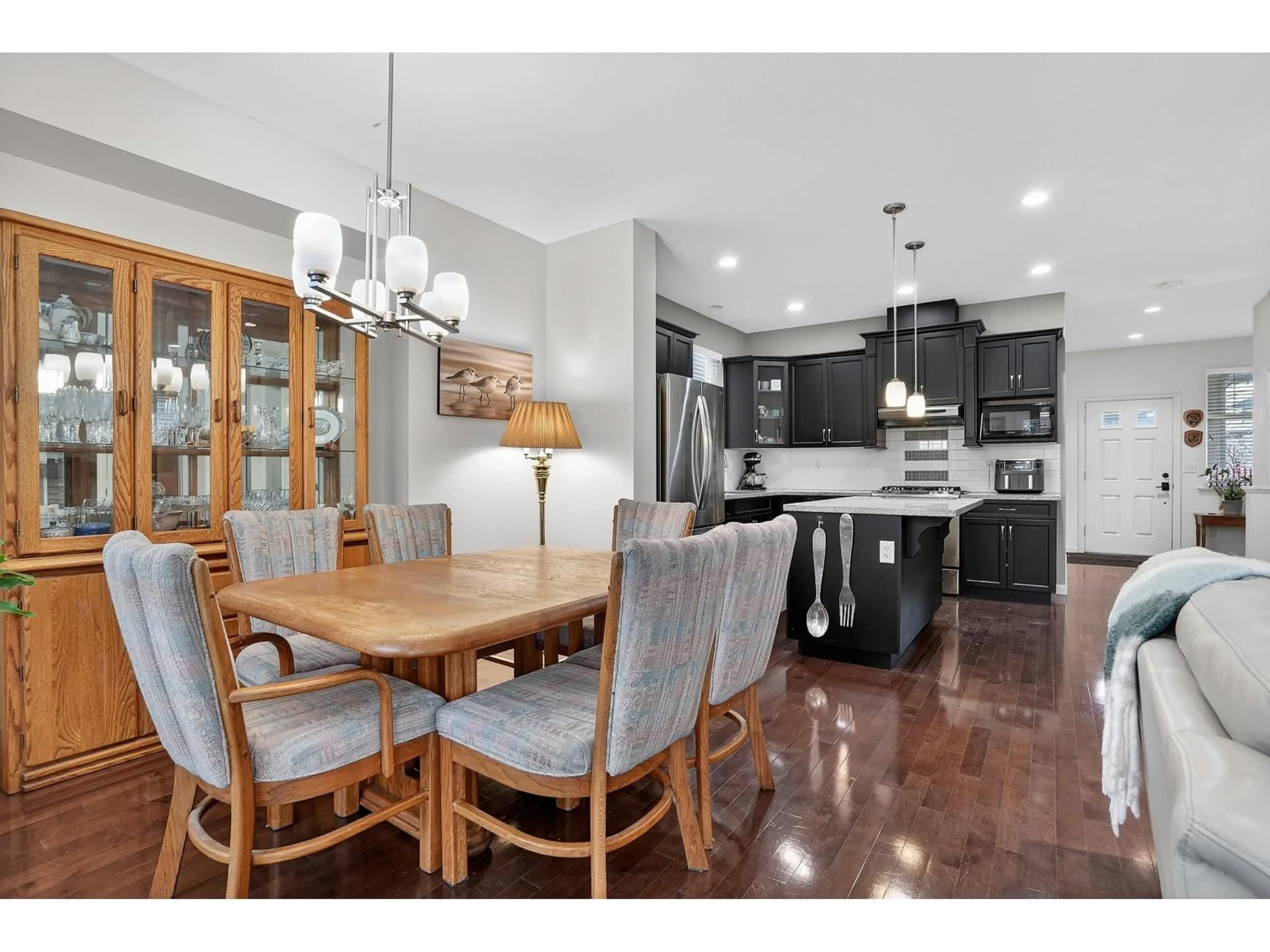 Open concept kitchen, wood/laminate floor for 6909 208B STREET, Langley British Columbia V2Y0G3