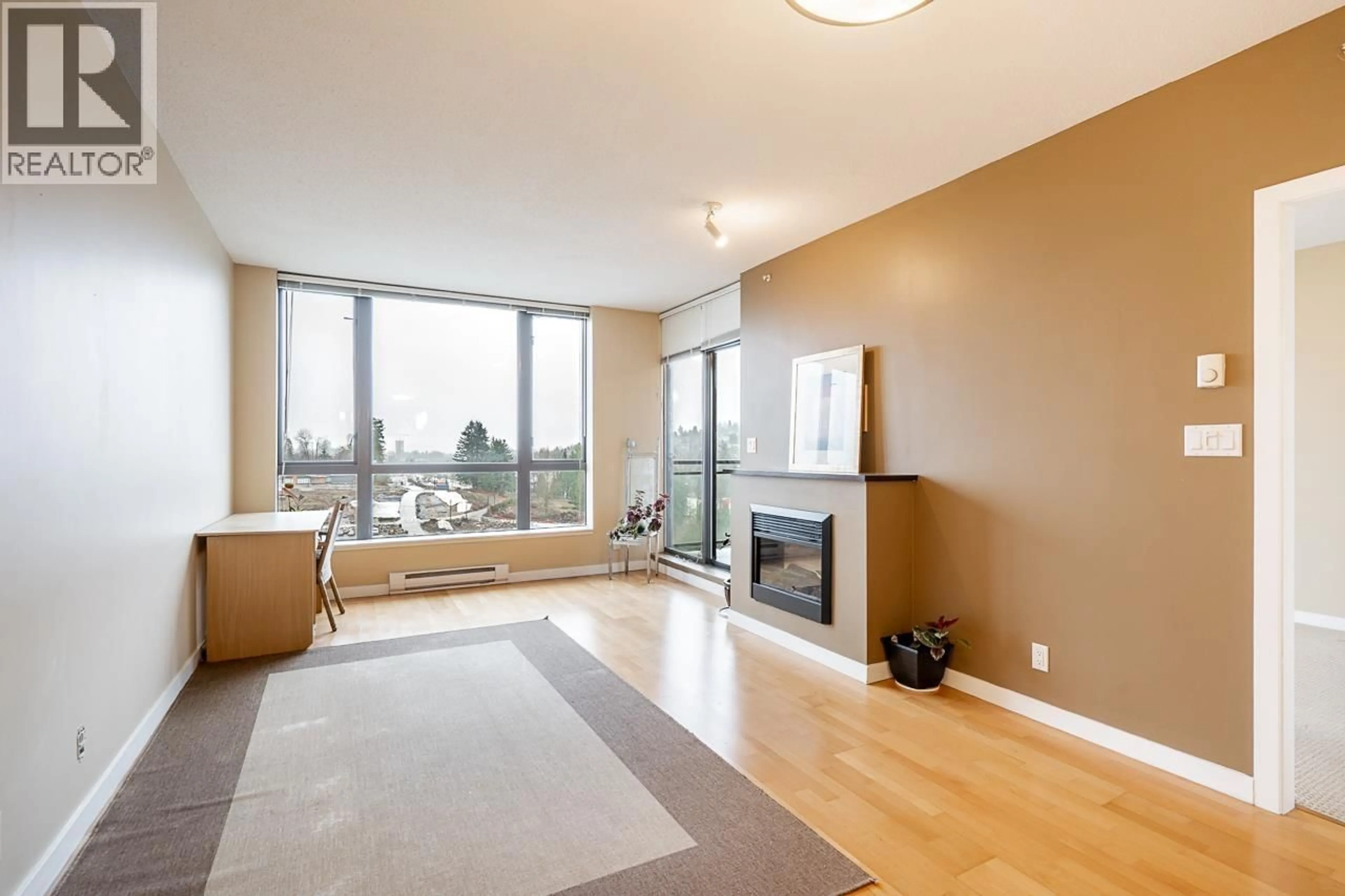 Living room with furniture, wood/laminate floor for 1701 - 400 CAPILANO ROAD, Port Moody British Columbia V3H0E1
