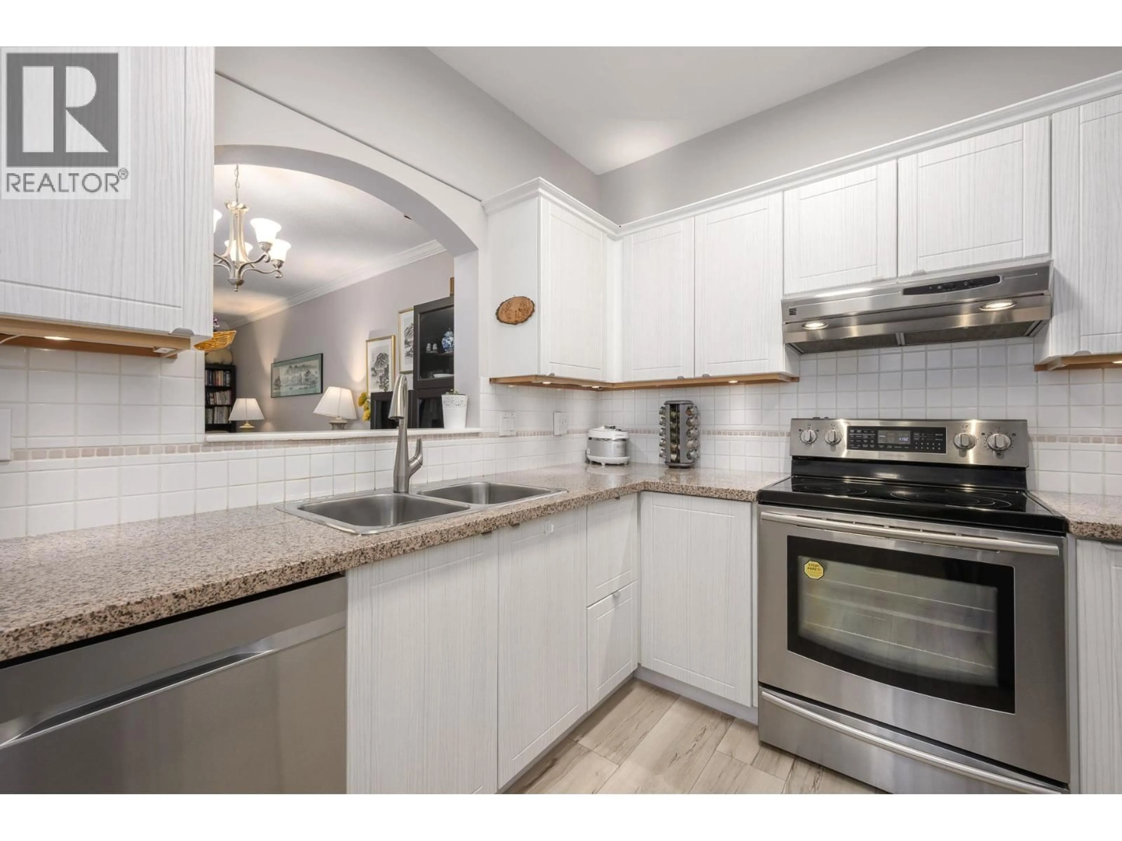 Open concept kitchen, unknown for 204 - 2995 PRINCESS CRESCENT, Coquitlam British Columbia V3B7N1