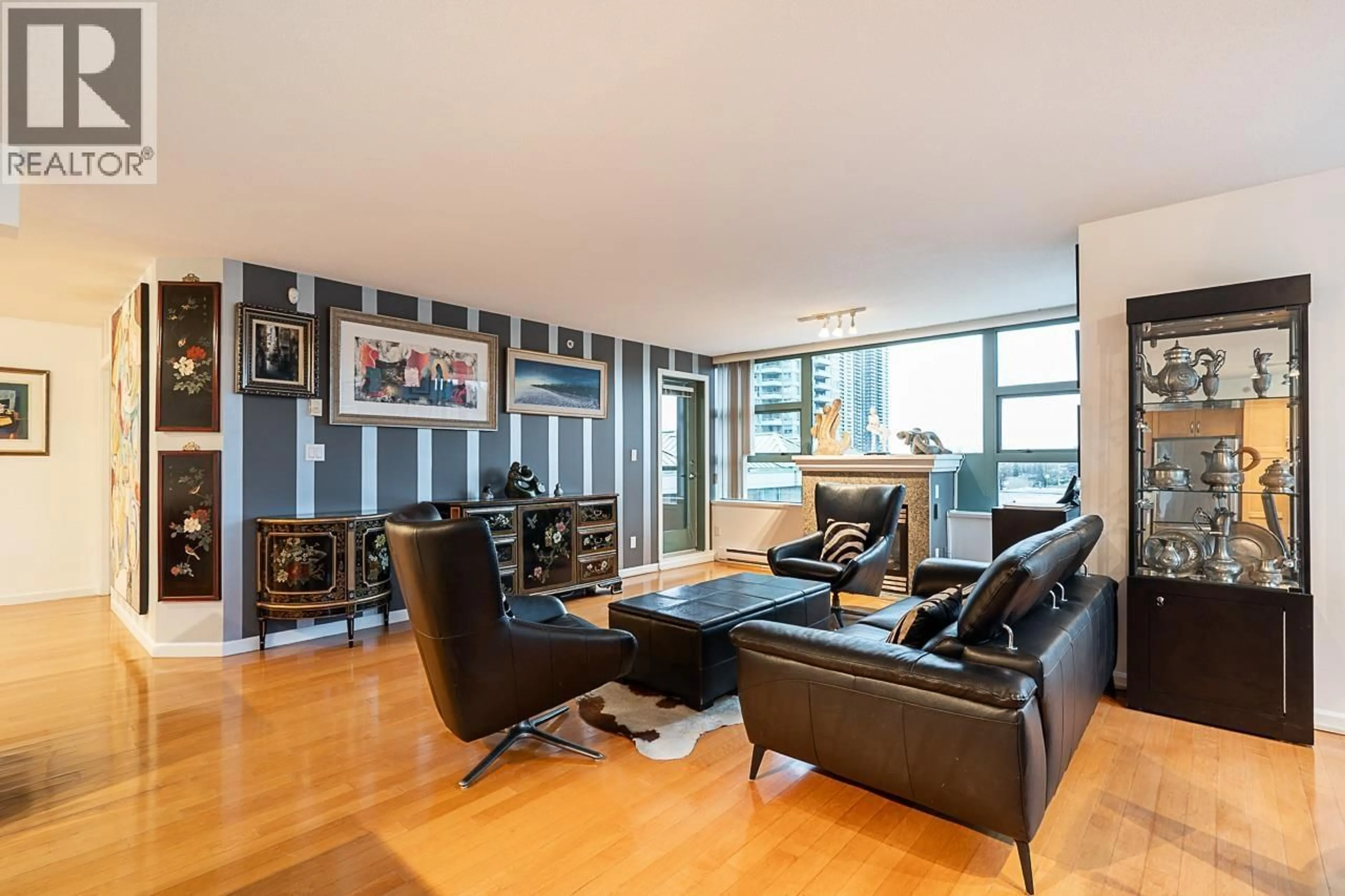 Living room with furniture, wood/laminate floor for 304 - 4380 HALIFAX STREET, Burnaby British Columbia V5C6R3