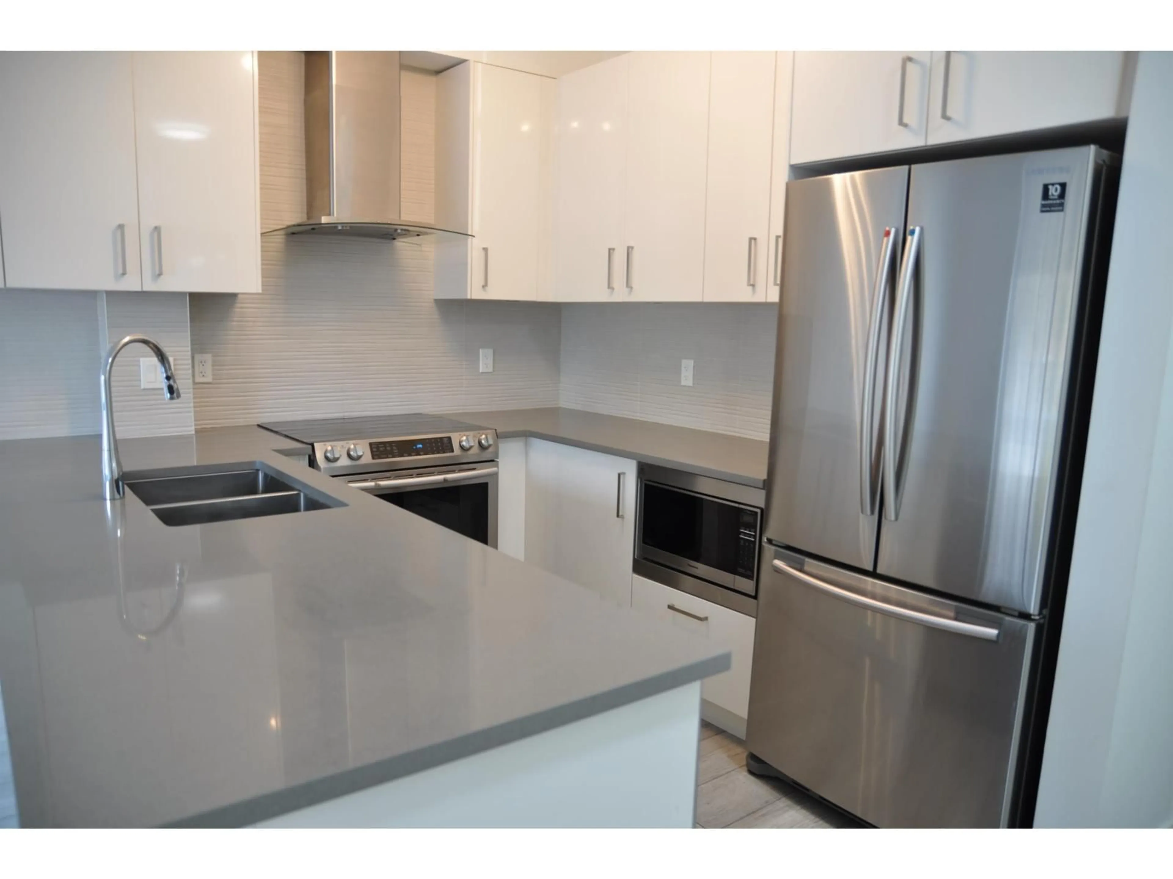 Open concept kitchen, unknown for 506 - 13978 FRASER HIGHWAY, Surrey British Columbia V3T9P2