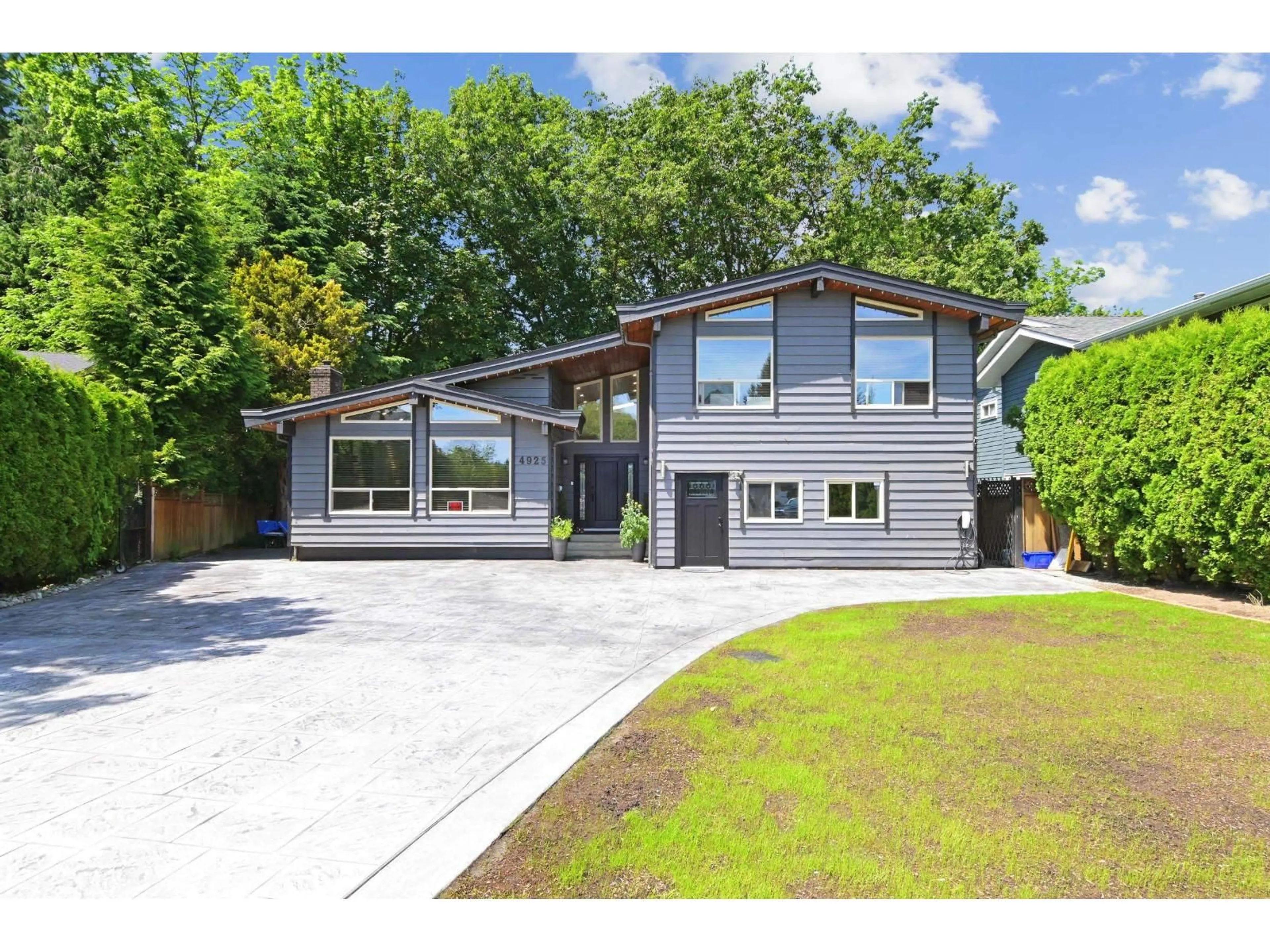 Home with brick exterior material, street for 4925 198B STREET, Langley British Columbia V3A6L4