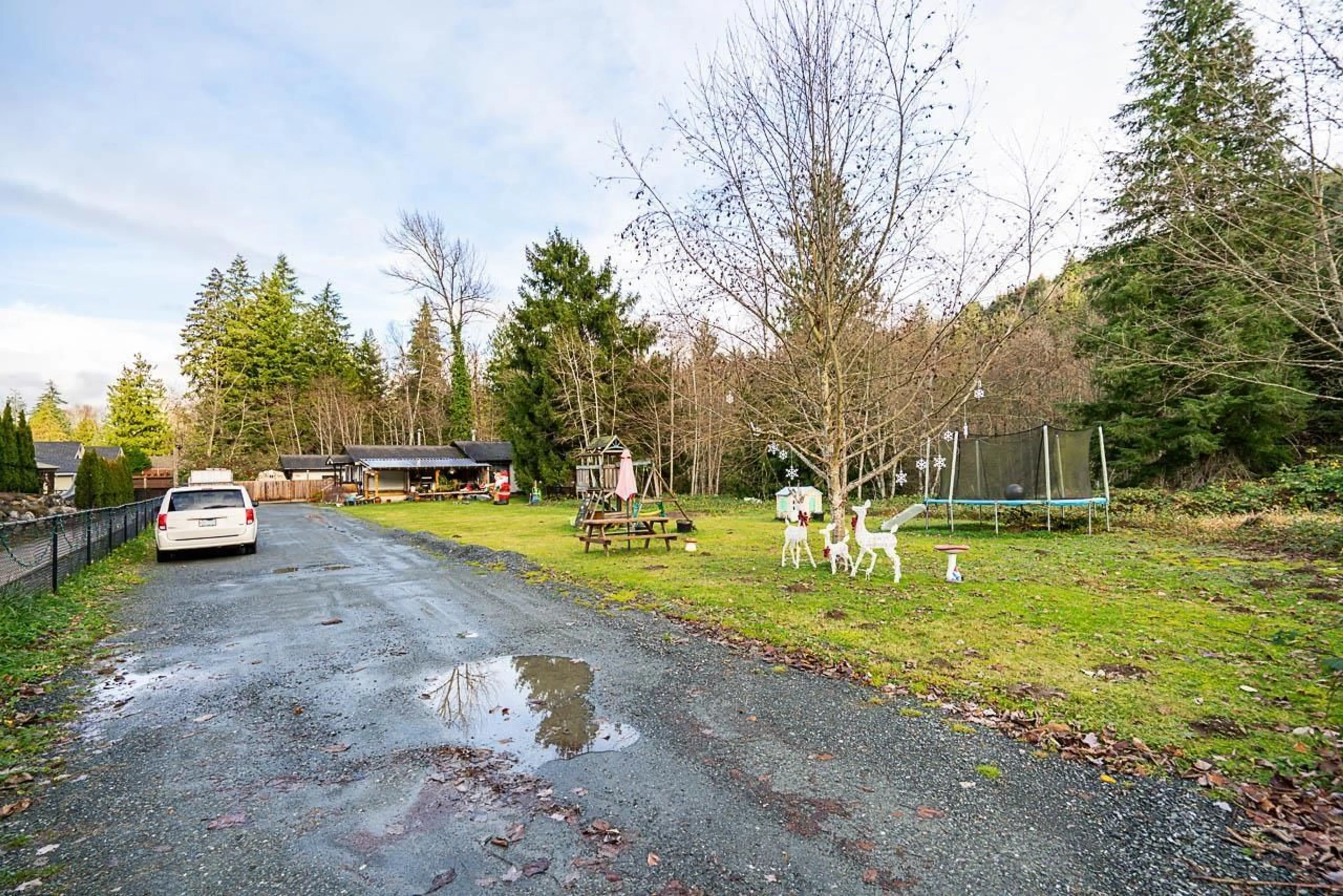 A pic from outside/outdoor area/front of a property/back of a property/a pic from drone, forest/trees view for 7350 RAMSAY PLACE, Chilliwack British Columbia V4Z1J5