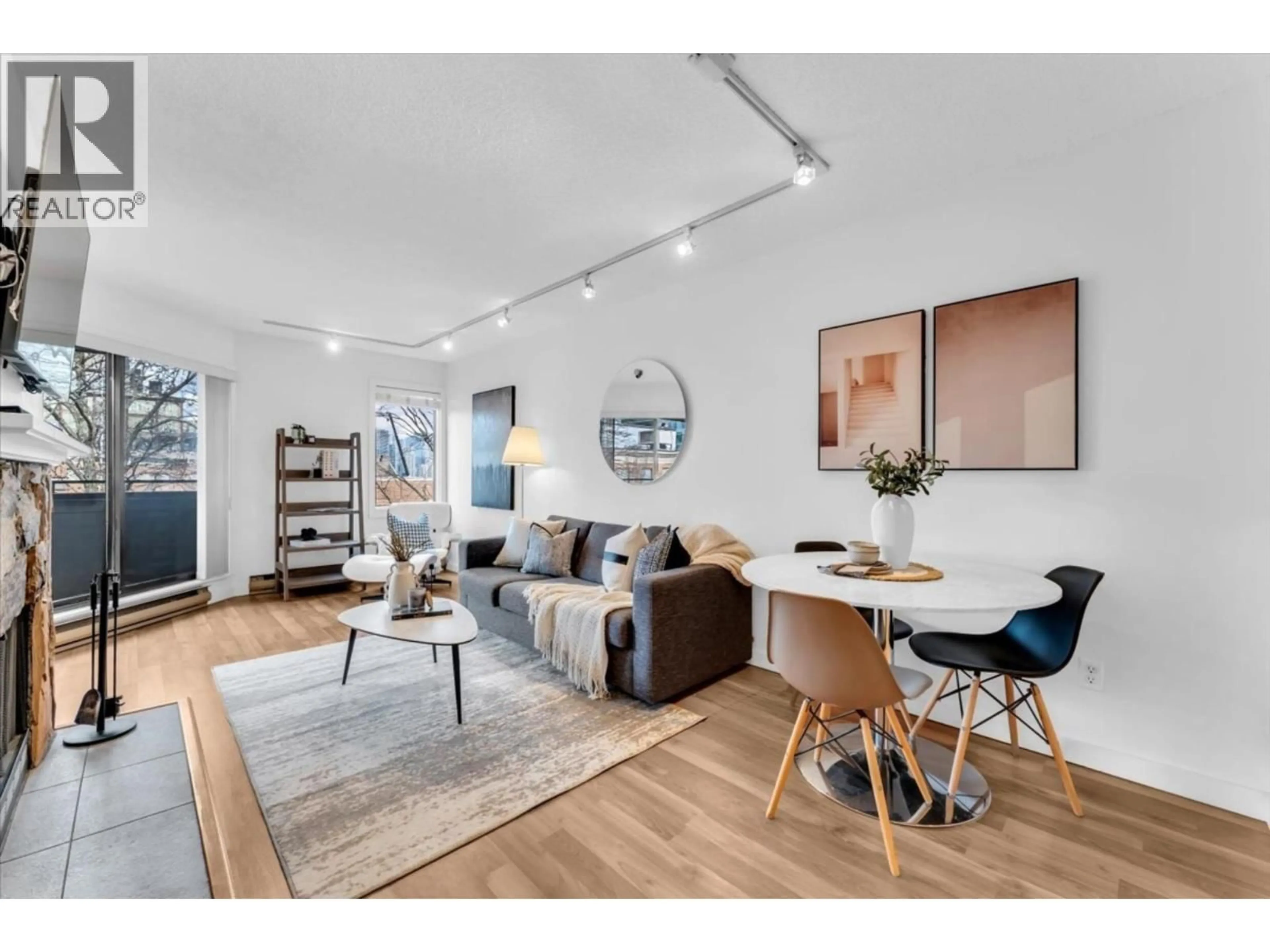 Living room with furniture, wood/laminate floor for 407 - 1476 10TH AVENUE, Vancouver British Columbia V6H1J9