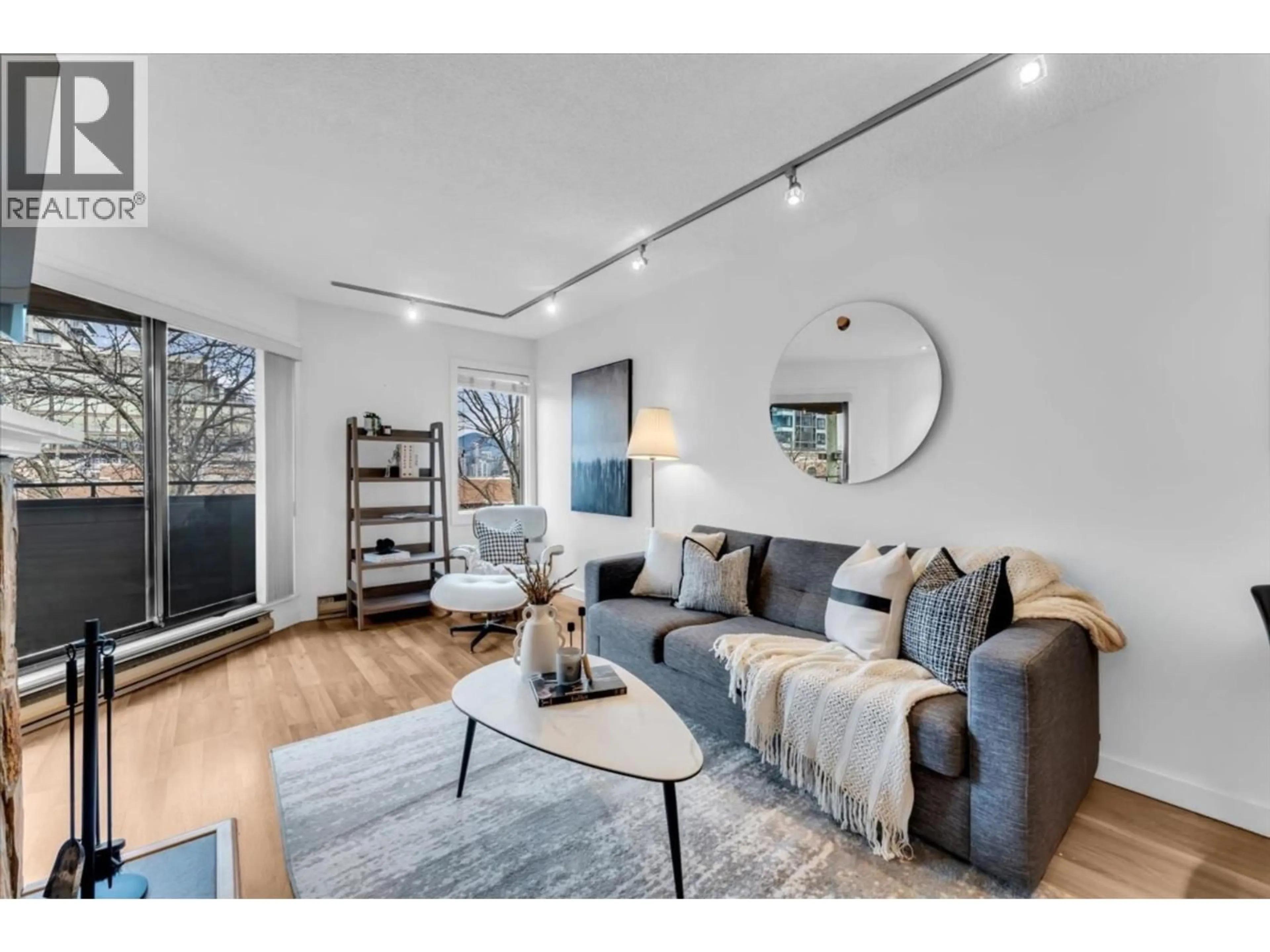 Living room with furniture, wood/laminate floor for 407 - 1476 10TH AVENUE, Vancouver British Columbia V6H1J9