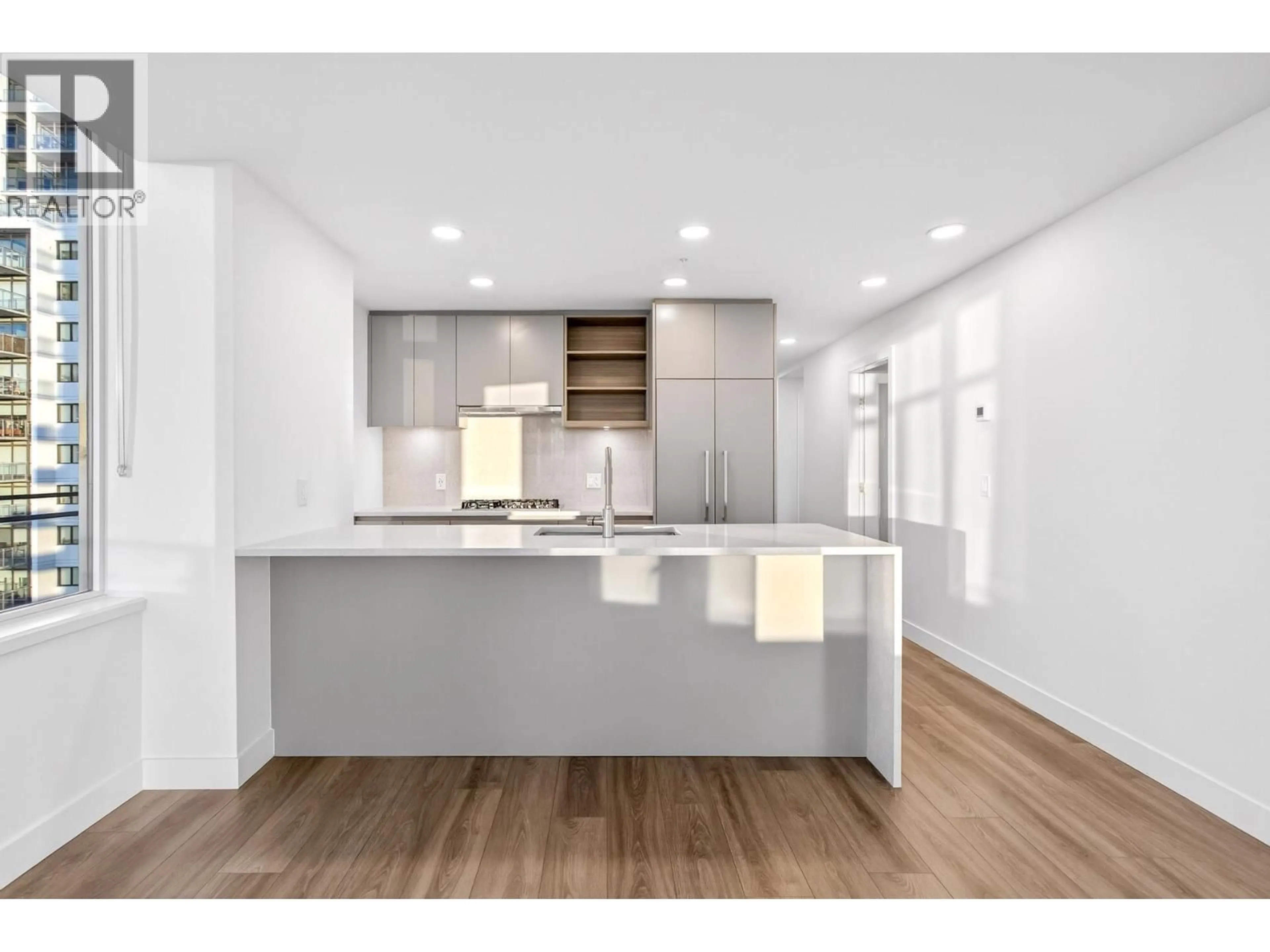 Open concept kitchen, wood/laminate floor for 1107 - 4433 ALASKA STREET, Burnaby British Columbia V5C5T3