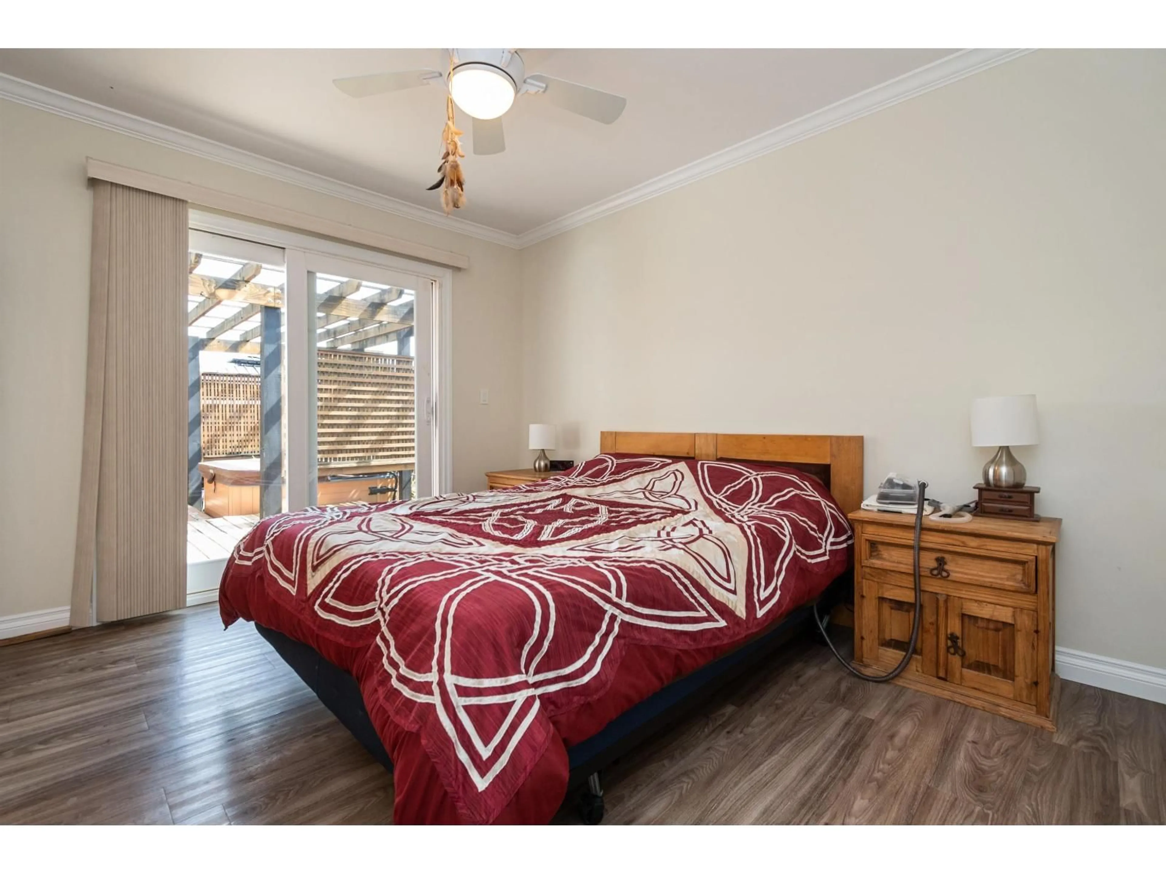 Bedroom with bed, wood/laminate floor for 9598 JOHNSON STREET, Chilliwack British Columbia V2P5Y2