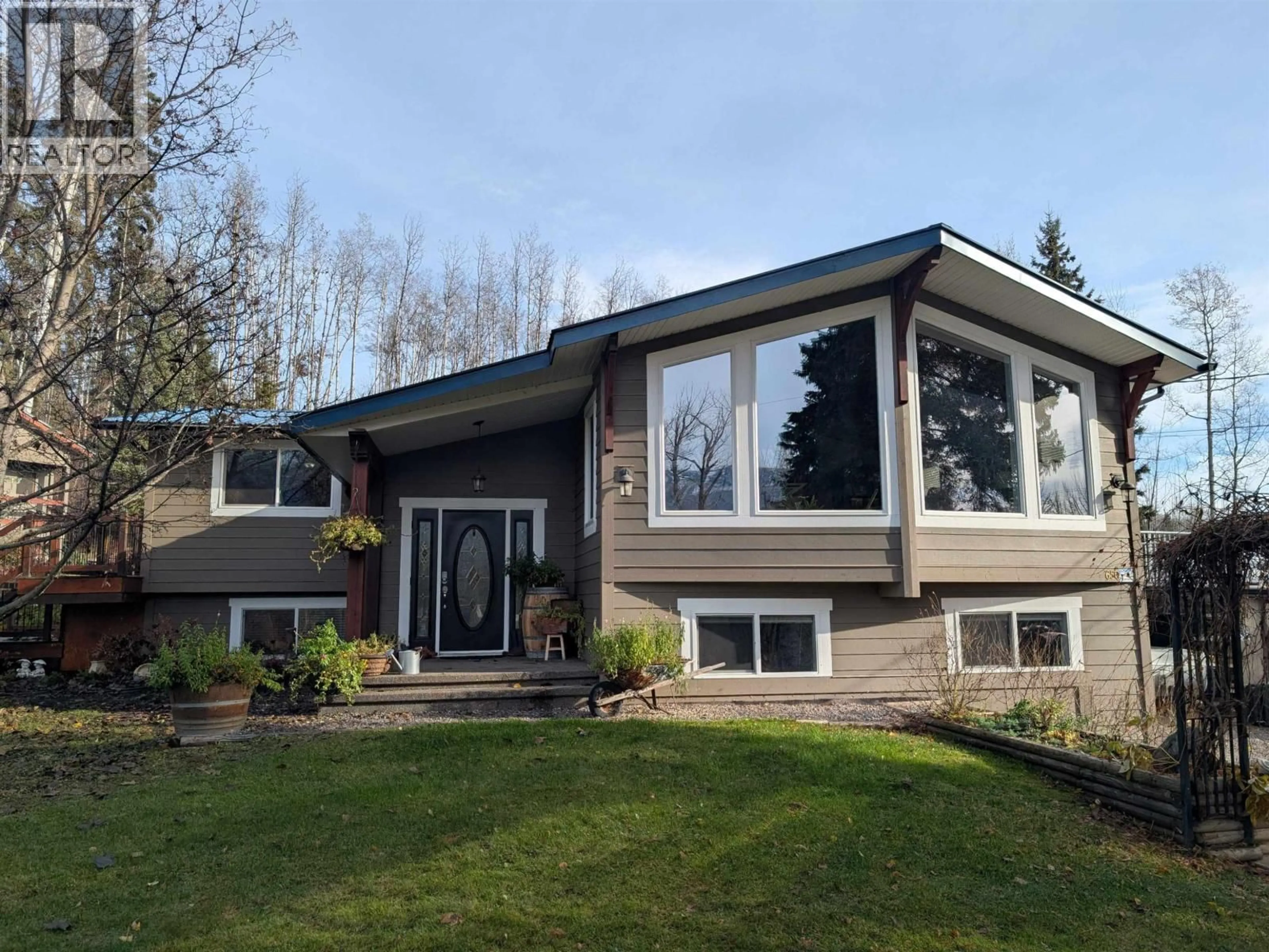 Home with vinyl exterior material, mountain view for 650 KIDD ROAD, Smithers British Columbia V0J2N6