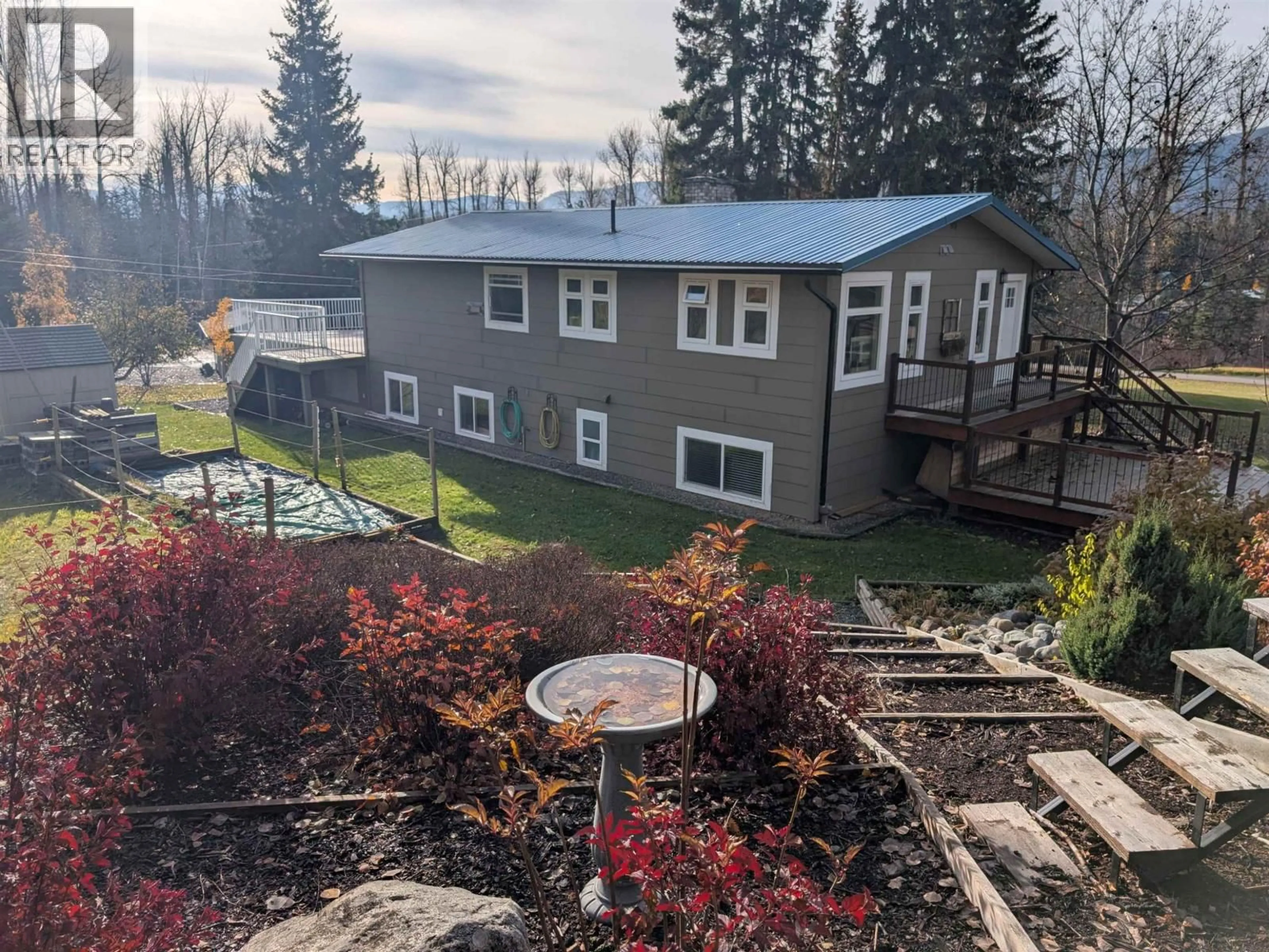 A pic from outside/outdoor area/front of a property/back of a property/a pic from drone, mountain view for 650 KIDD ROAD, Smithers British Columbia V0J2N6