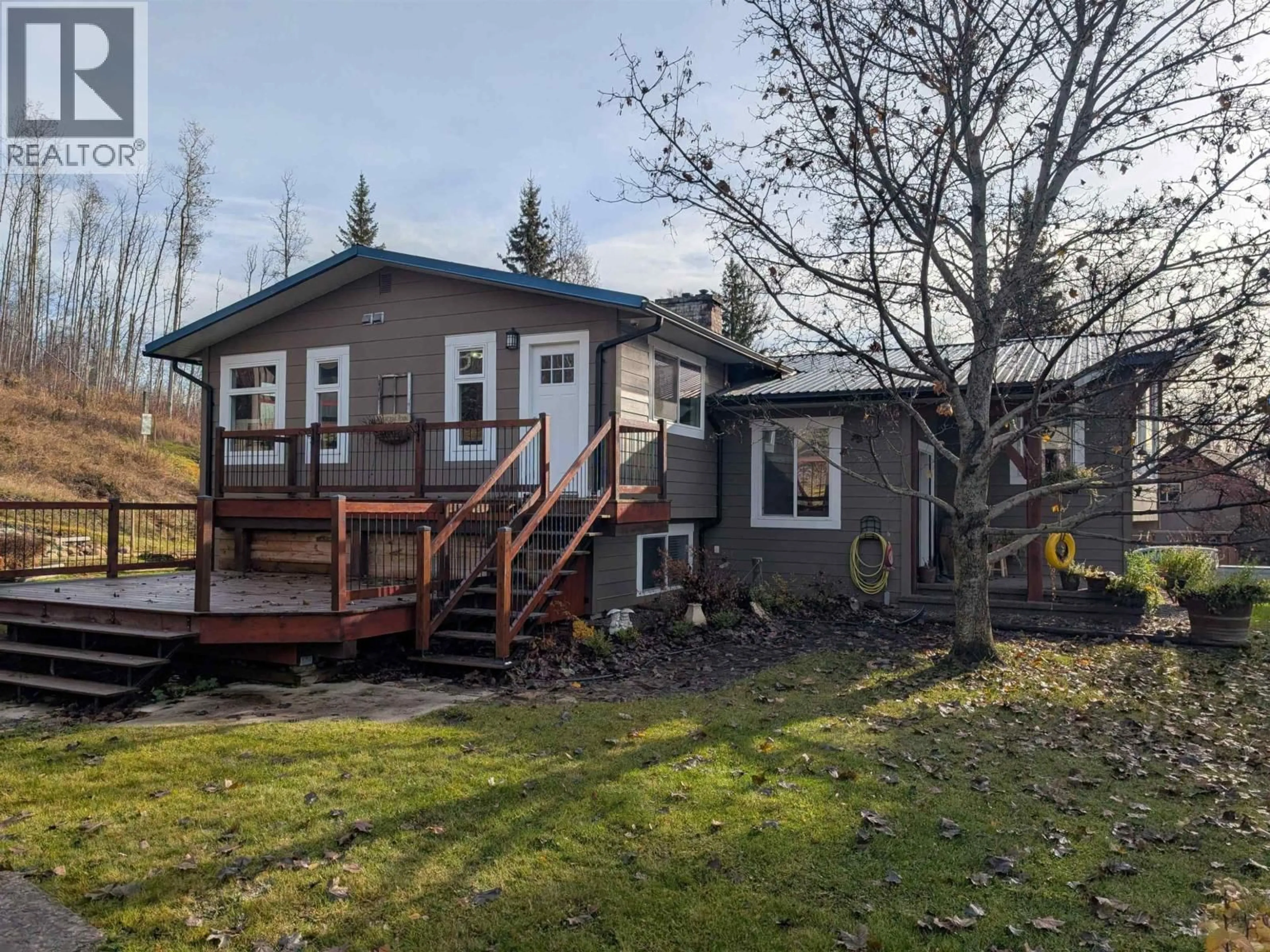 A pic from outside/outdoor area/front of a property/back of a property/a pic from drone, unknown for 650 KIDD ROAD, Smithers British Columbia V0J2N6