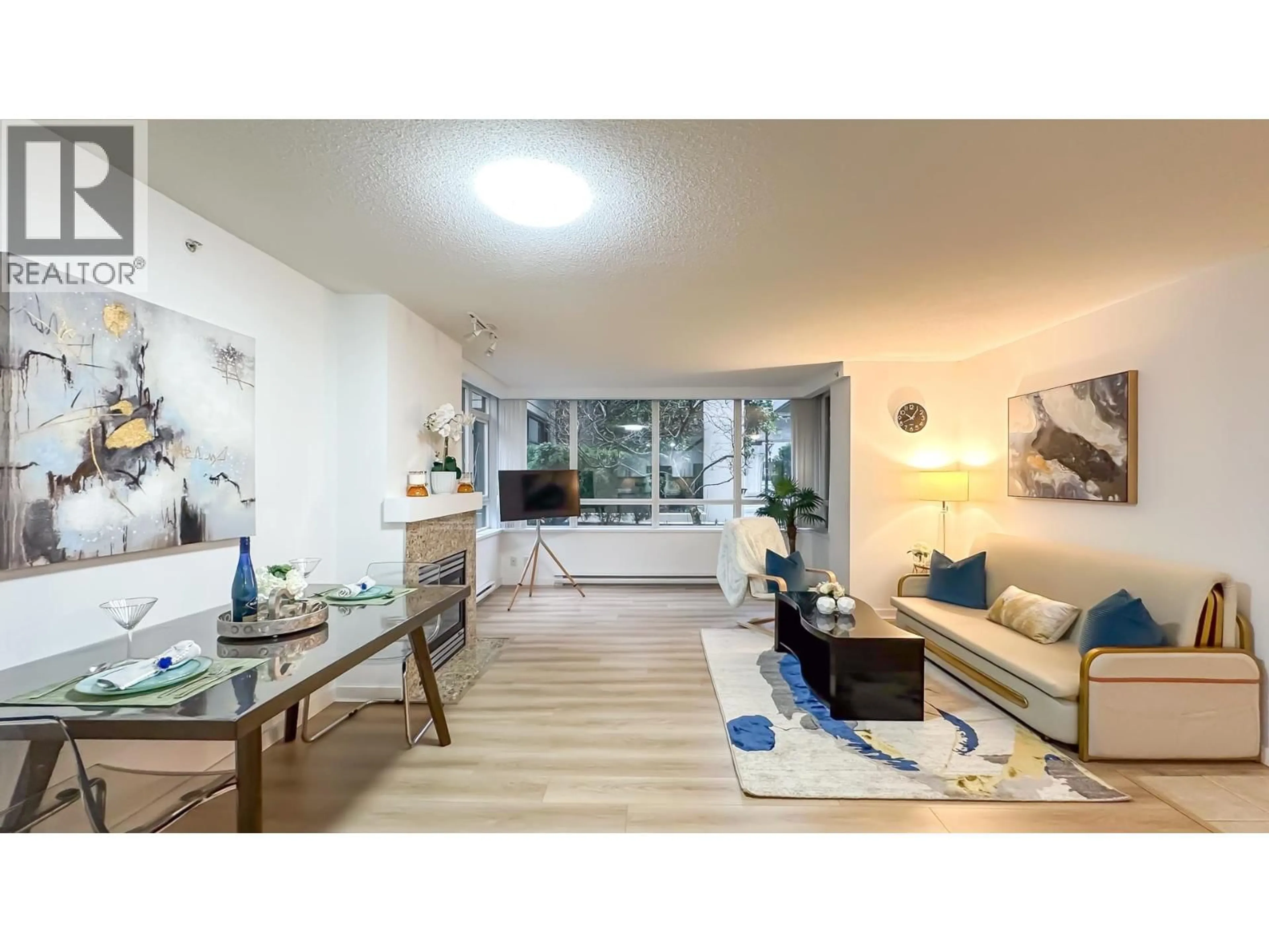 Living room with furniture, wood/laminate floor for 305 - 2088 MADISON AVENUE, Burnaby British Columbia V5C6T5