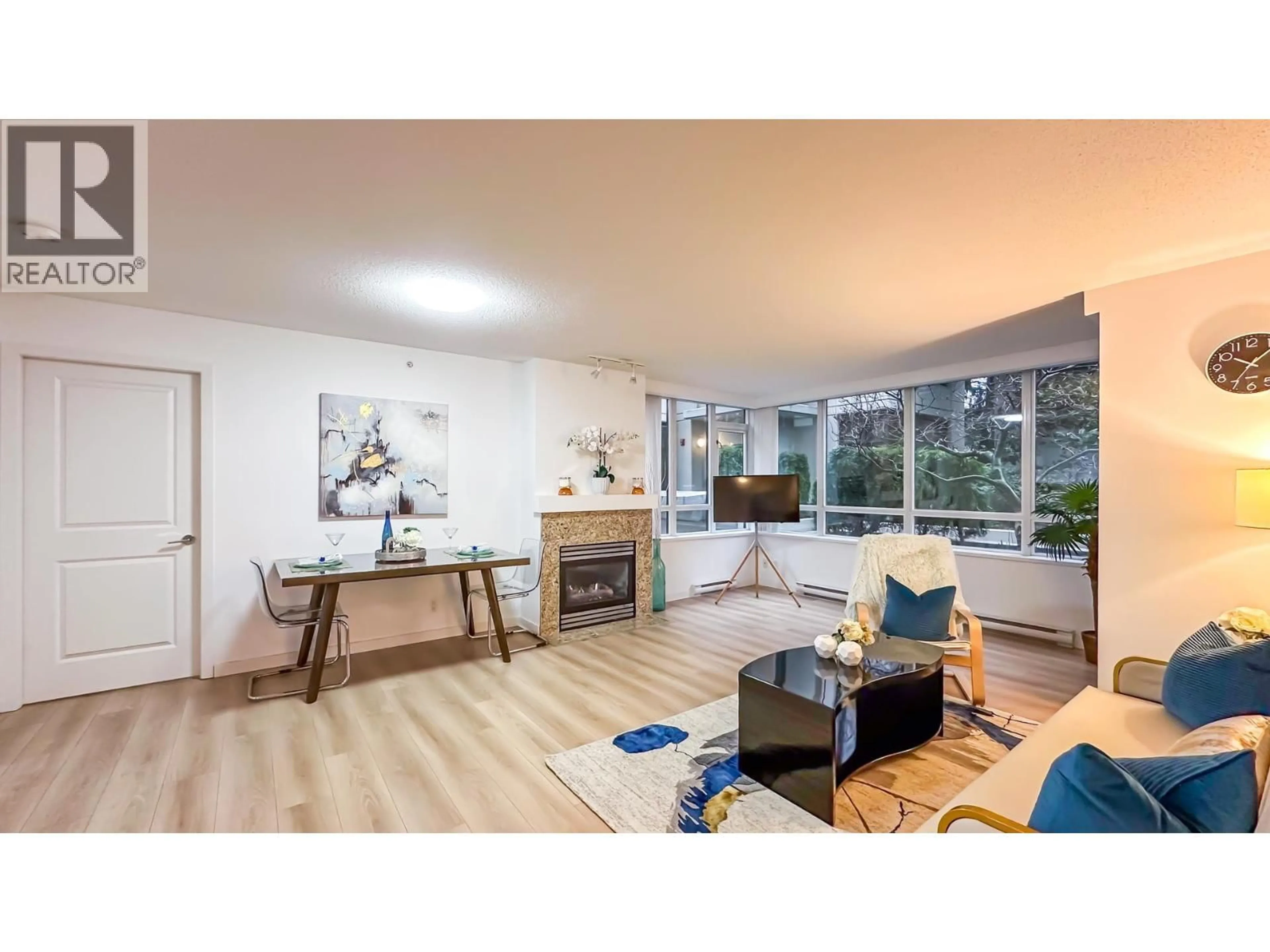 Living room with furniture, wood/laminate floor for 305 - 2088 MADISON AVENUE, Burnaby British Columbia V5C6T5