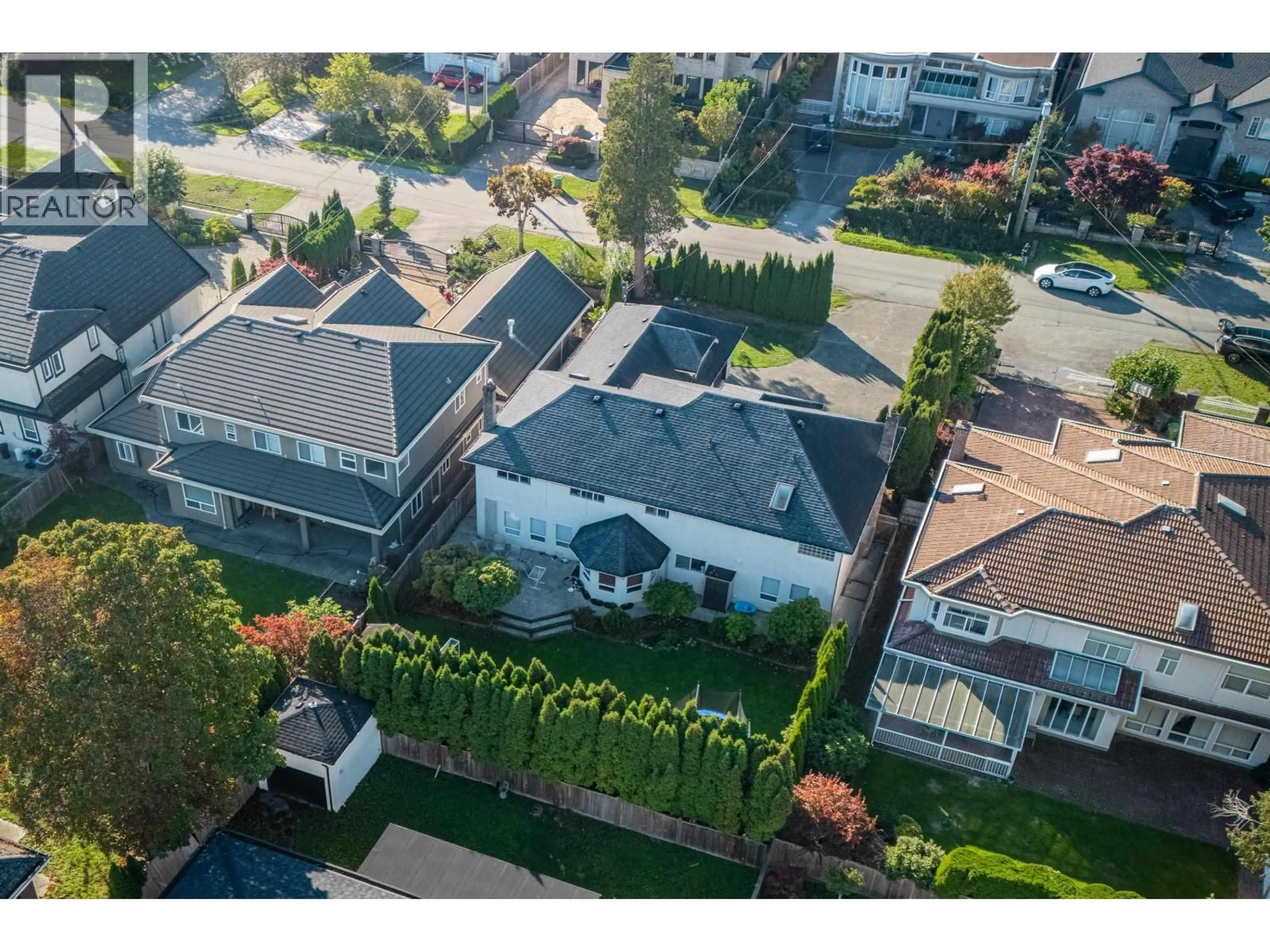 A pic from outside/outdoor area/front of a property/back of a property/a pic from drone, street for 7420 MONTANA ROAD, Richmond British Columbia V7C2K8