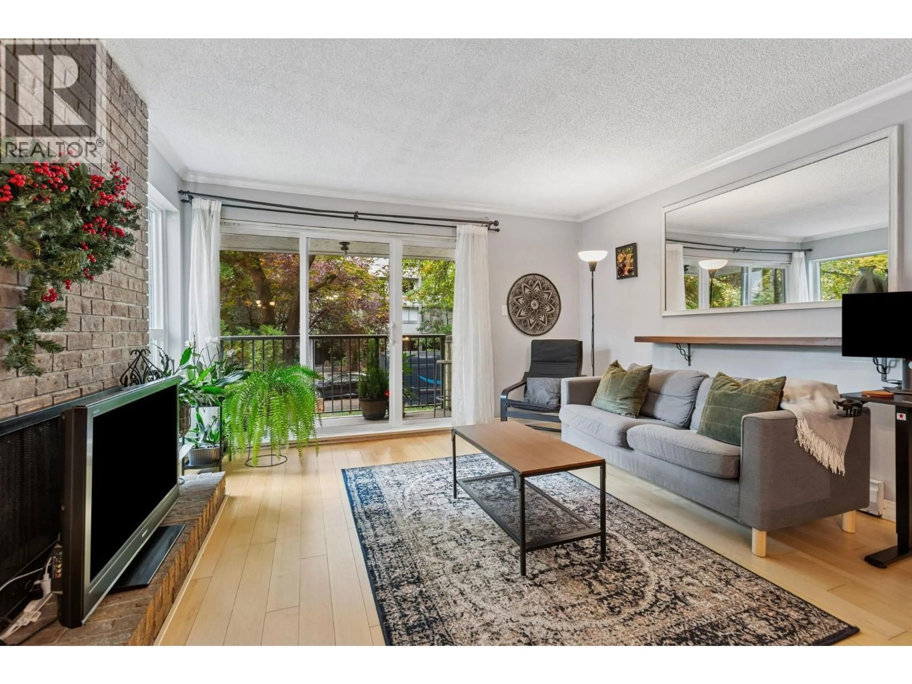 Living room with furniture, unknown for 204 - 1234 PENDRELL STREET, Vancouver British Columbia V6E1L6