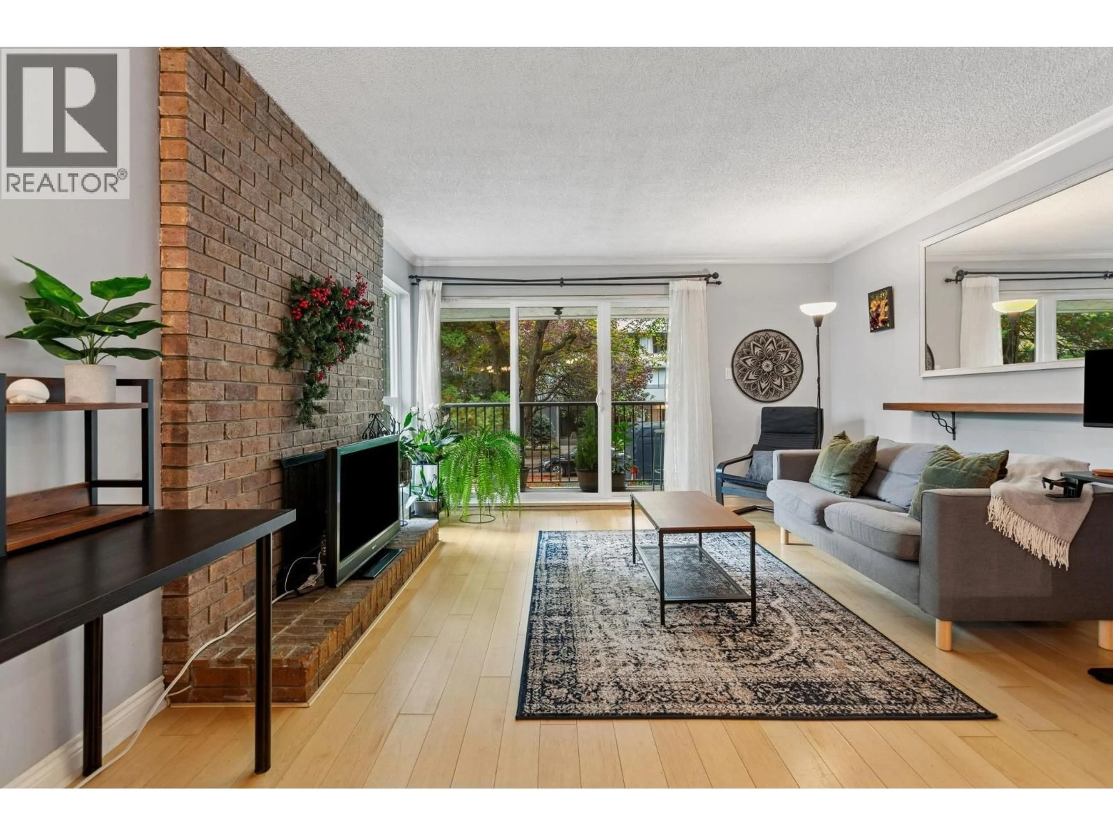 Living room with furniture, unknown for 204 - 1234 PENDRELL STREET, Vancouver British Columbia V6E1L6