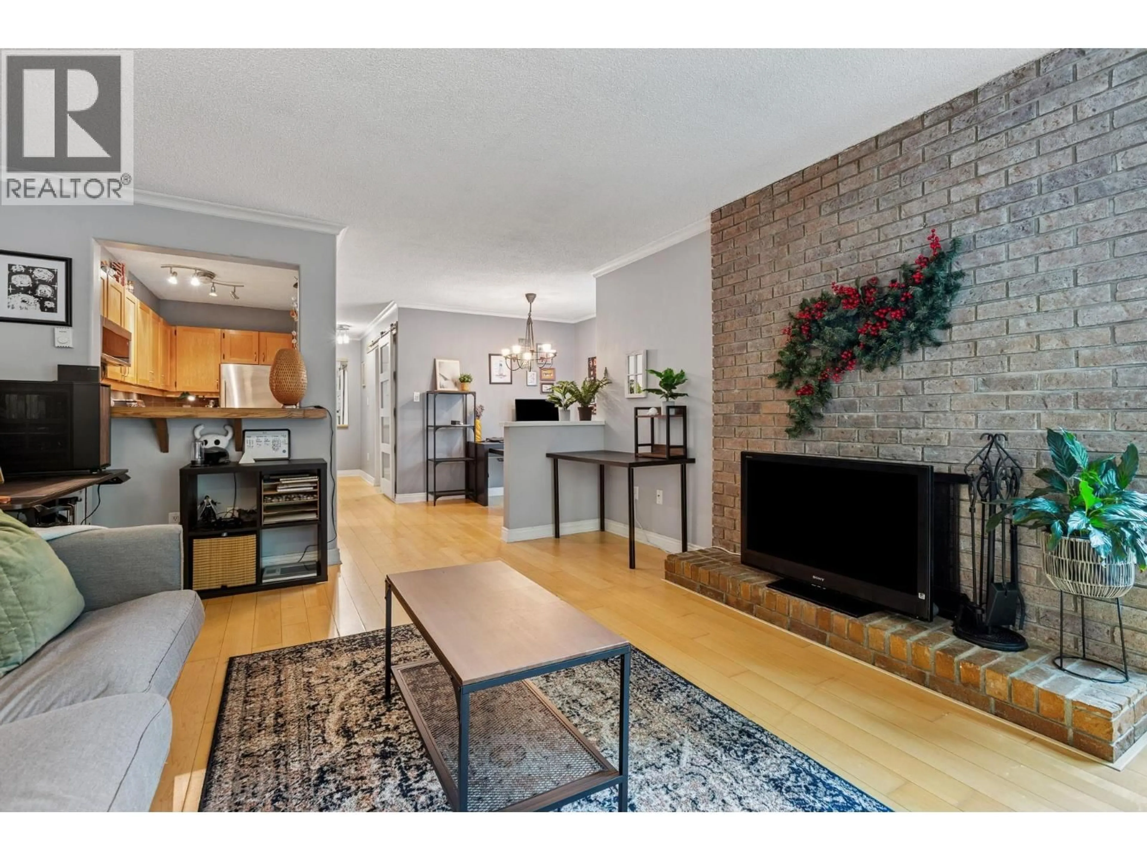 Living room with furniture, unknown for 204 - 1234 PENDRELL STREET, Vancouver British Columbia V6E1L6