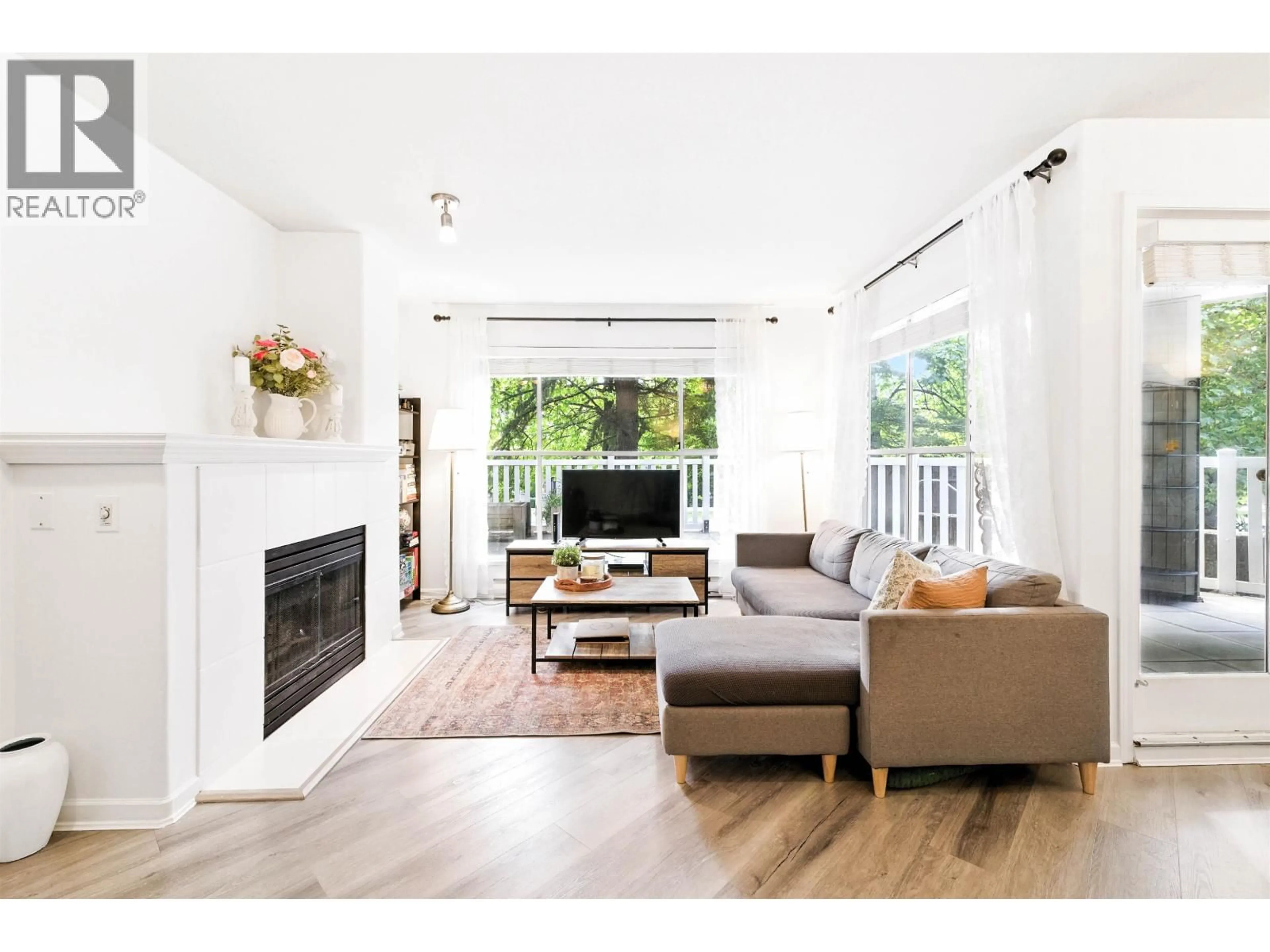 Living room with furniture, wood/laminate floor for 143 - 8880 JONES ROAD, Richmond British Columbia V6Y3Z1