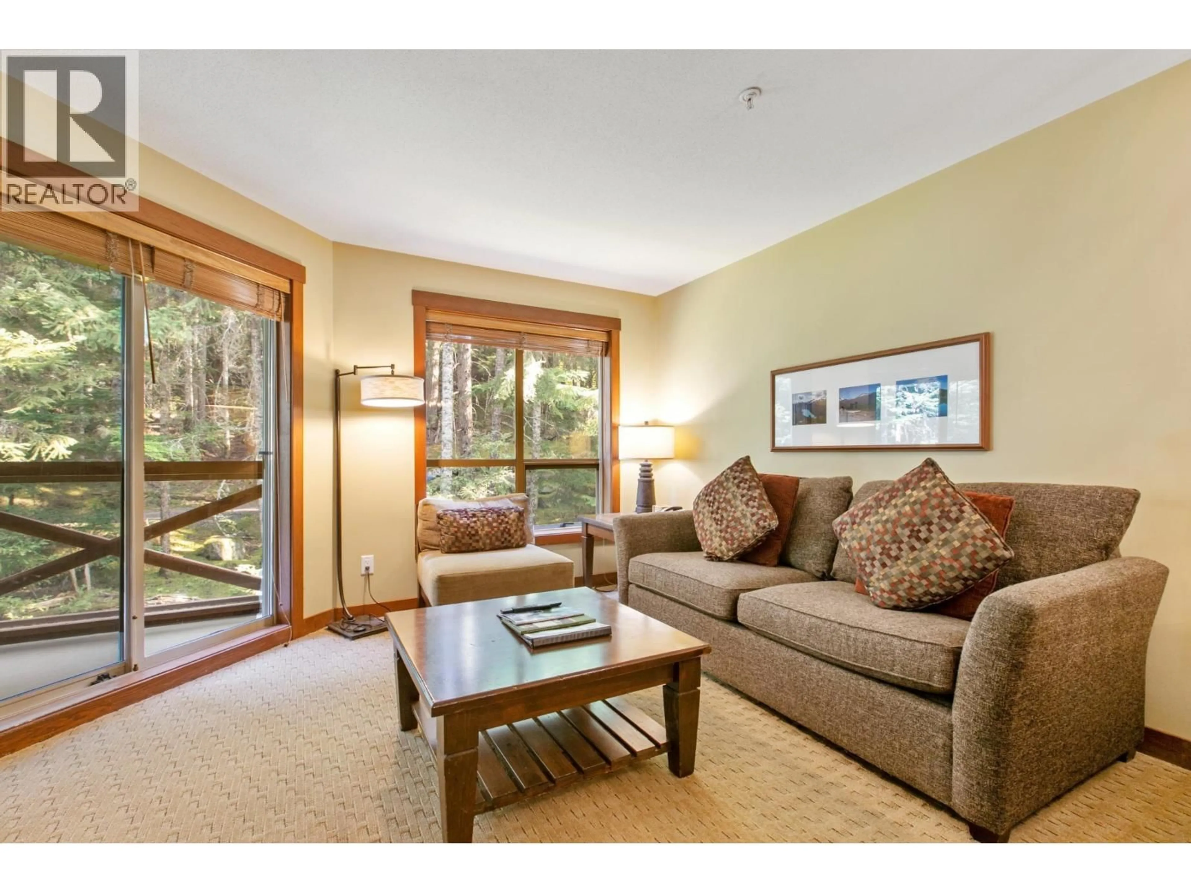 Living room with furniture, wood/laminate floor for 310G2 - 4653 BLACKCOMB WAY, Whistler British Columbia V8E0Y9